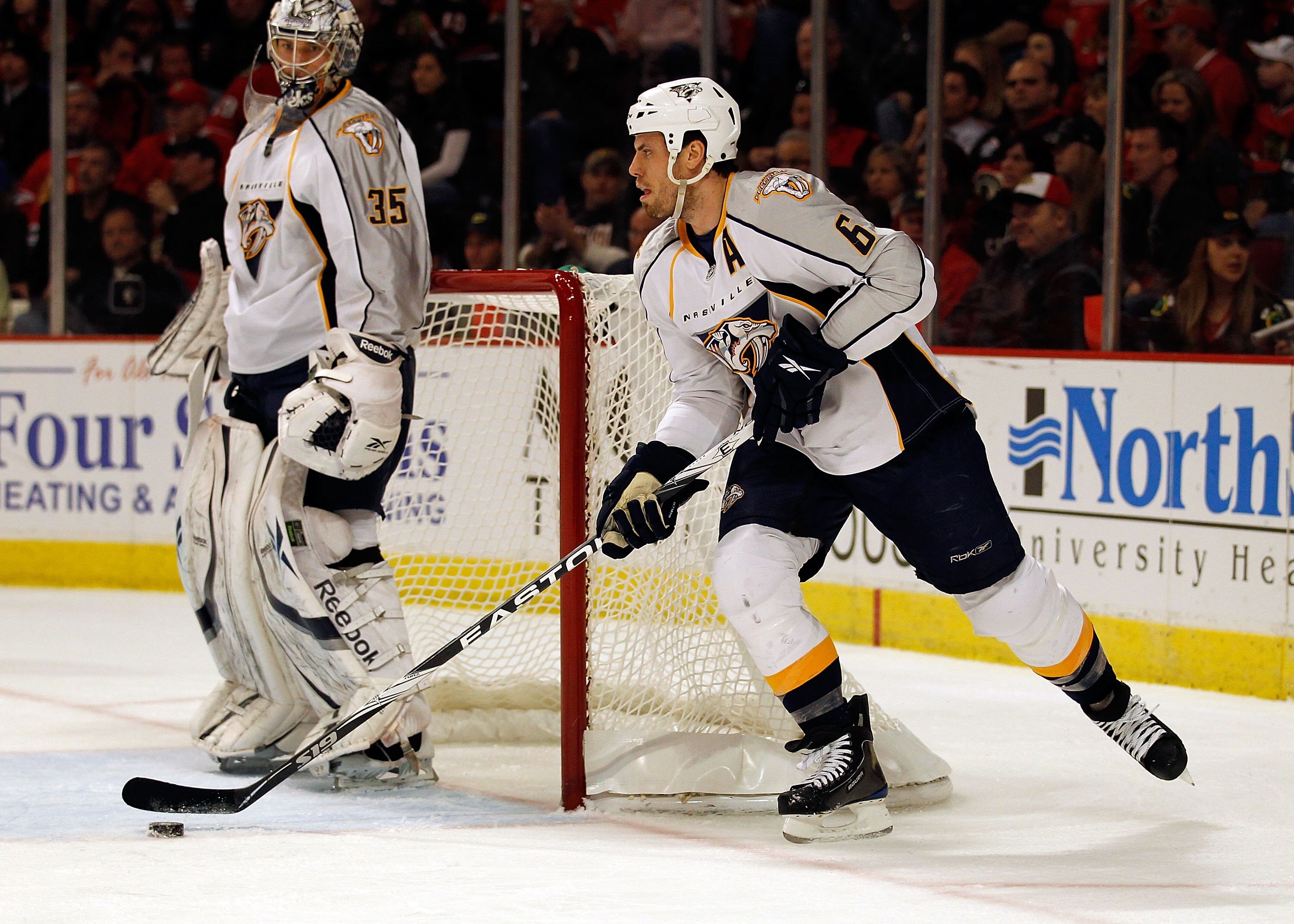 CHICAGO - APRIL 18: Shea Weber #6 of the Nashville Predators looks to move up the ice next to Pekka Rinne #35 against the Chicago Blackhawks in Game Two of the Western Conference Quarterfinals during the 2010 NHL Stanley Cup Playoffs at the United Center