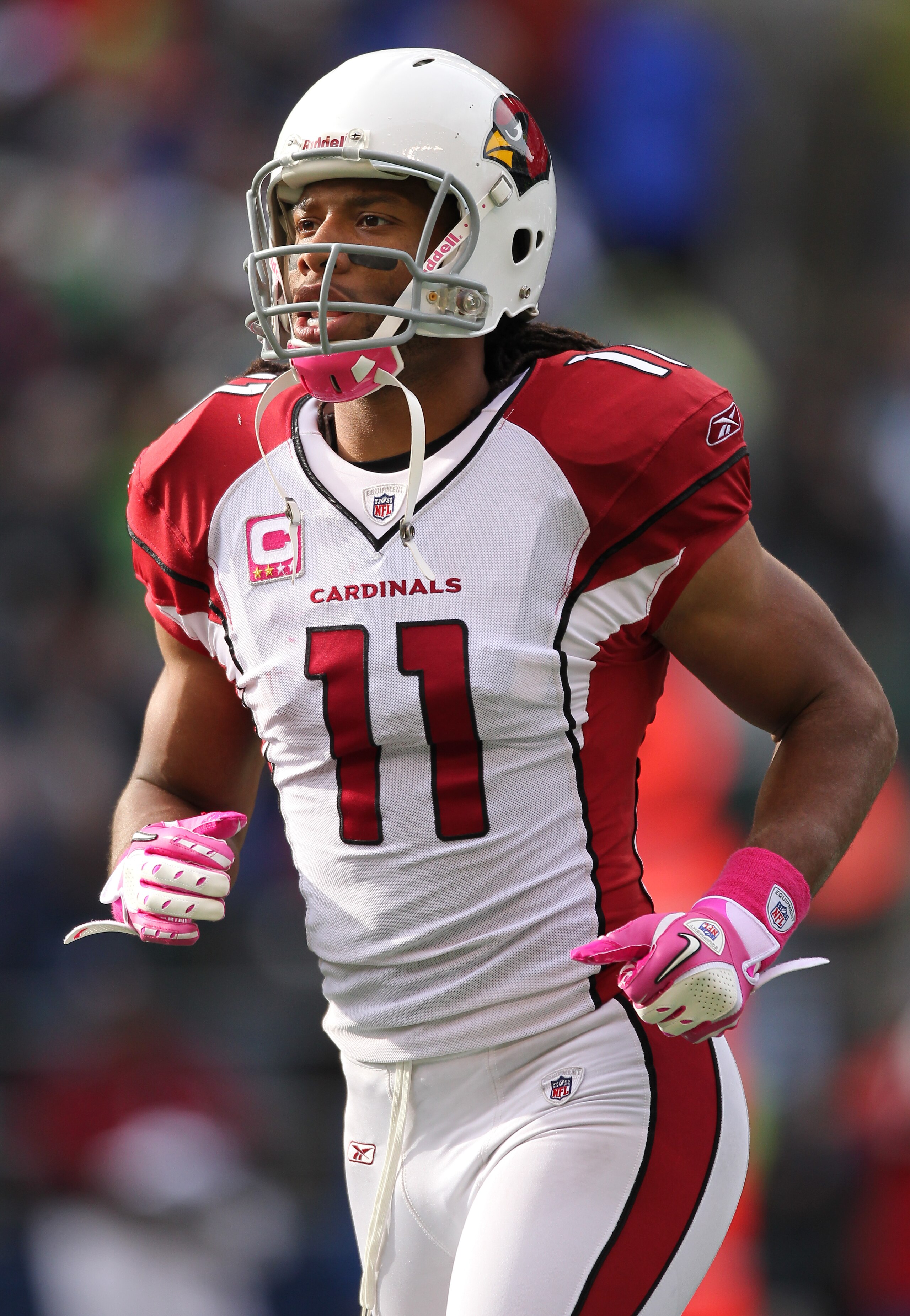 SEATTLE - OCTOBER 24: Wide receiver Larry Fitzgerald #11 of the Arizona Cardinals looks on during the game against the Seattle Seahawks at Qwest Field on October 24, 2010 in Seattle, Washington. (Photo by Otto Greule Jr/Getty Images) SEATTLE - OCTOBER 24: Wide receiver Larry Fitzgerald #11 of the Arizona Cardinals looks on during the game against the Seattle Seahawks at Qwest Field on October 24, 2010 in Seattle, Washington. (Photo by Otto Greule Jr/Getty Images)