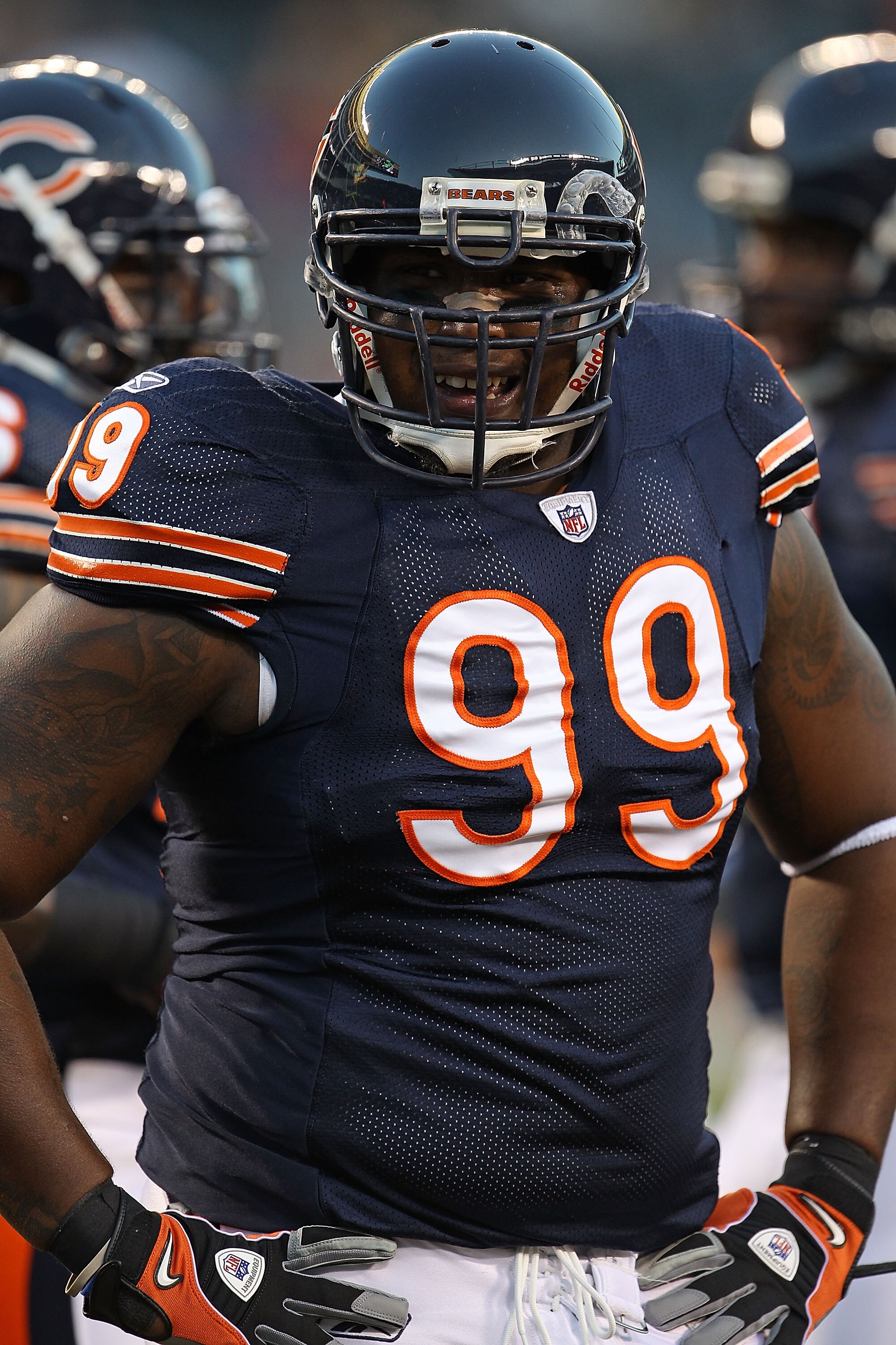 CHICAGO - AUGUST 28: Marcus Harrison #99 of the Chicago Bears participates in warm-ups before a preseason game against the Arizona Cardinals at Soldier Field on August 28, 2010 in Chicago, Illinois. The Cardinals defeated the Bears 14-9.  (Photo by Jonath