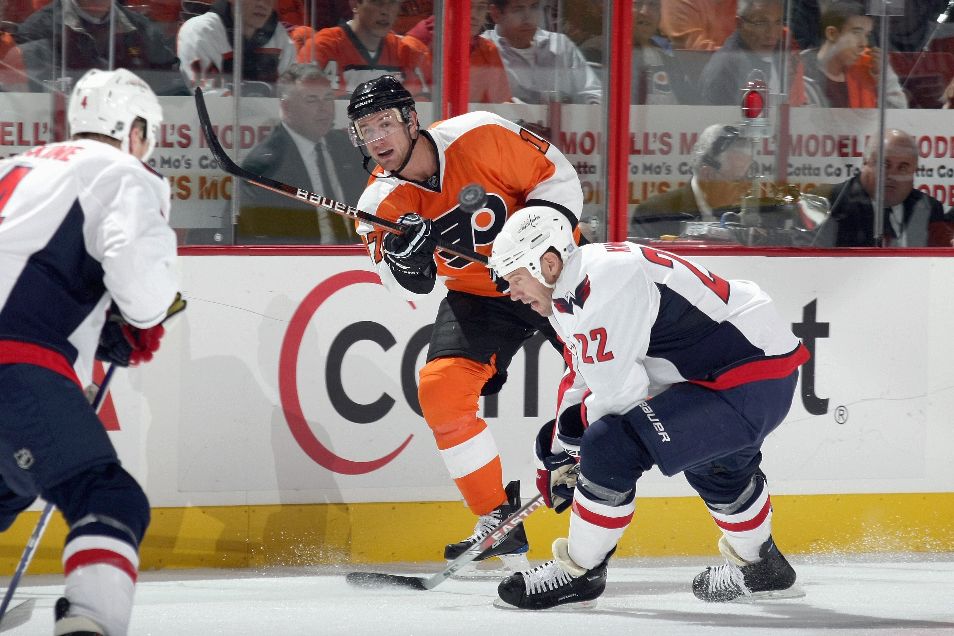 PHILADELPHIA - OCTOBER 06:  Jeff Carter #17 of the Philadelphia Flyers passes the puck against the Washington Capitals at the Wachovia Center on October 6, 2009 in Philadelphia, Pennsylvania.  (Photo by Bruce Bennett/Getty Images)