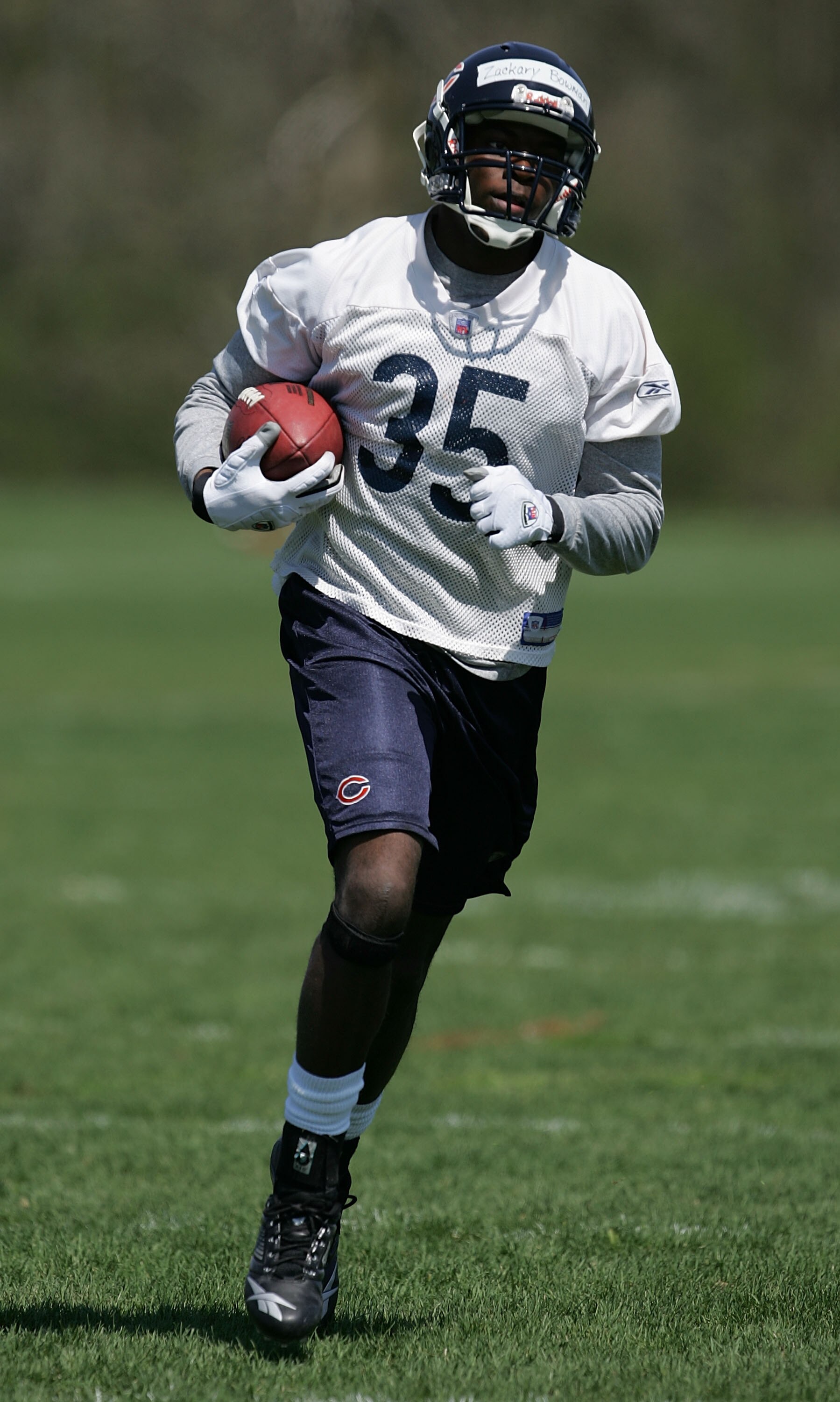 LAKE FOREST, IL - MAY 04:  Zackary Bowman #35 of the Chicago Bears runs with the ball during a rookie mini-camp practice at Halas Hall May 4, 2008 in Lake Forest, Illinois. (Photo by Jonathan Daniel/Getty Images)