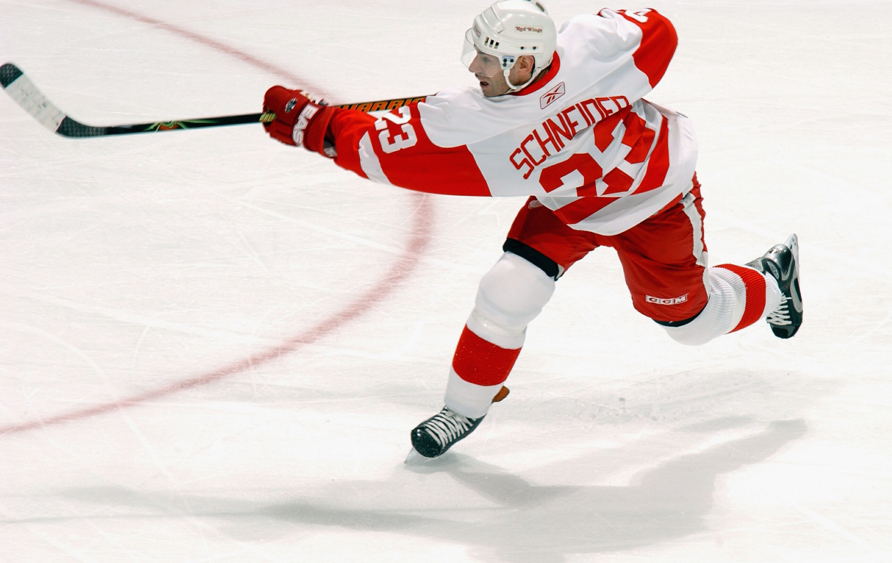 ATLANTA, GA  -  DECEMBER 13: Mathieu Schneider #23 of the Detroit Red Wings shoots against the Atlanta Thrashers on December 13, 2005 at Philips Arena in Atlanta, Georgia. The Thrashers won the game 7-6. (Photo by Scott Cunningham/Getty Images)