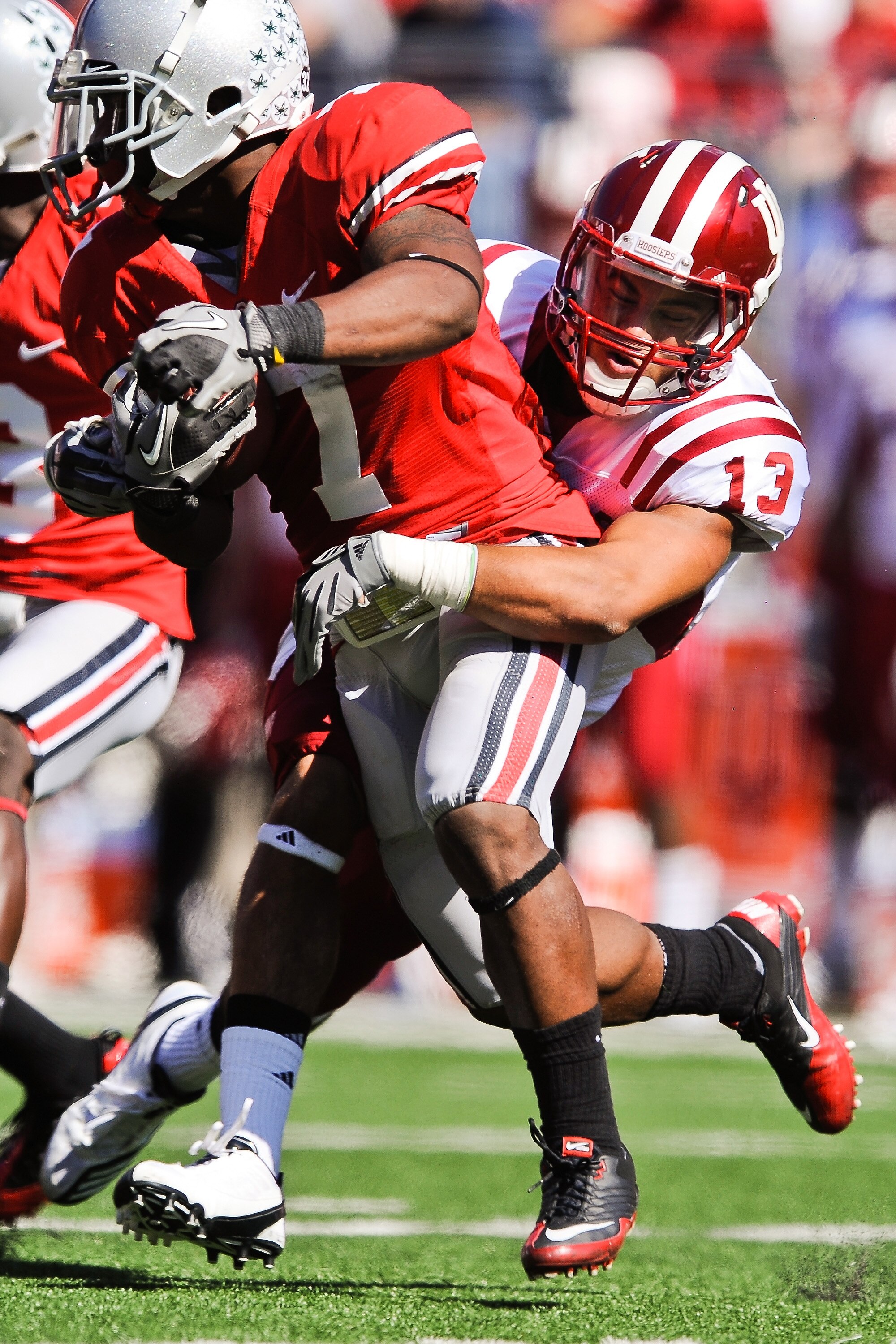 COLUMBUS, OH - OCTOBER 9:  Kofi Hughes #13 of the Indiana Hoosiers makes a tackle on kickoff return against the Ohio State Buckeyes at Ohio Stadium on October 9, 2010 in Columbus, Ohio.  (Photo by Jamie Sabau/Getty Images)