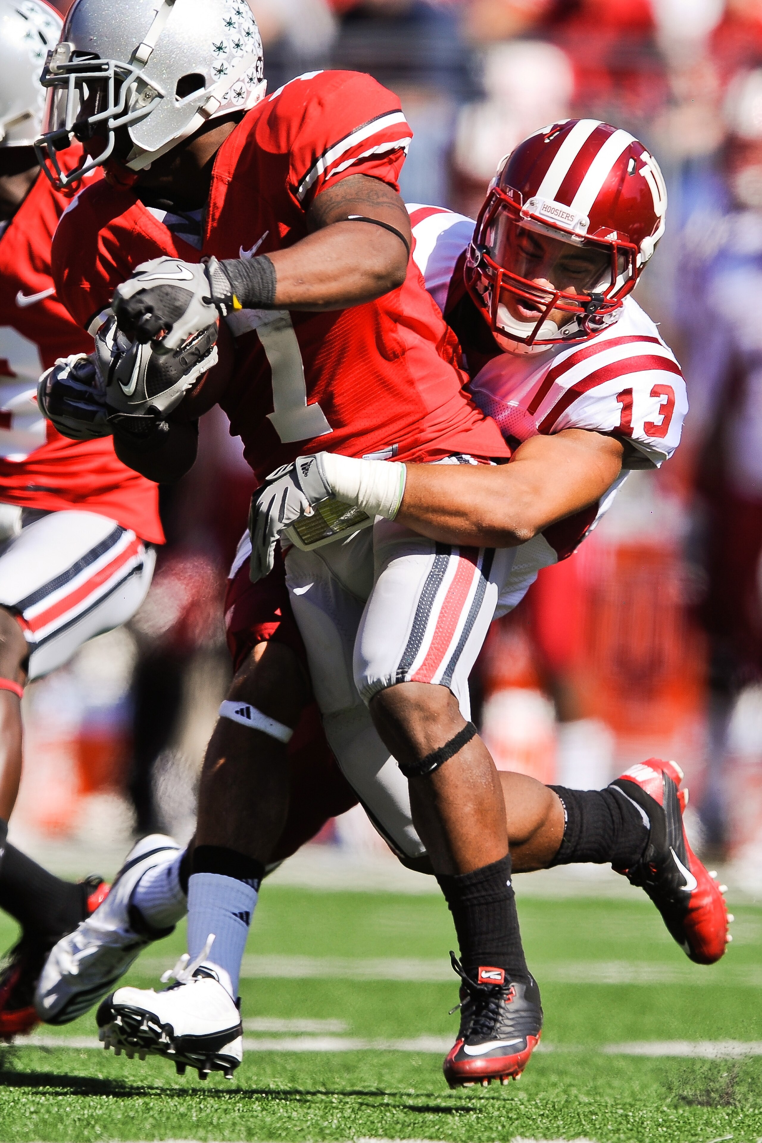 COLUMBUS, OH - OCTOBER 9:  Kofi Hughes #13 of the Indiana Hoosiers makes a tackle on kickoff return against the Ohio State Buckeyes at Ohio Stadium on October 9, 2010 in Columbus, Ohio.  (Photo by Jamie Sabau/Getty Images)