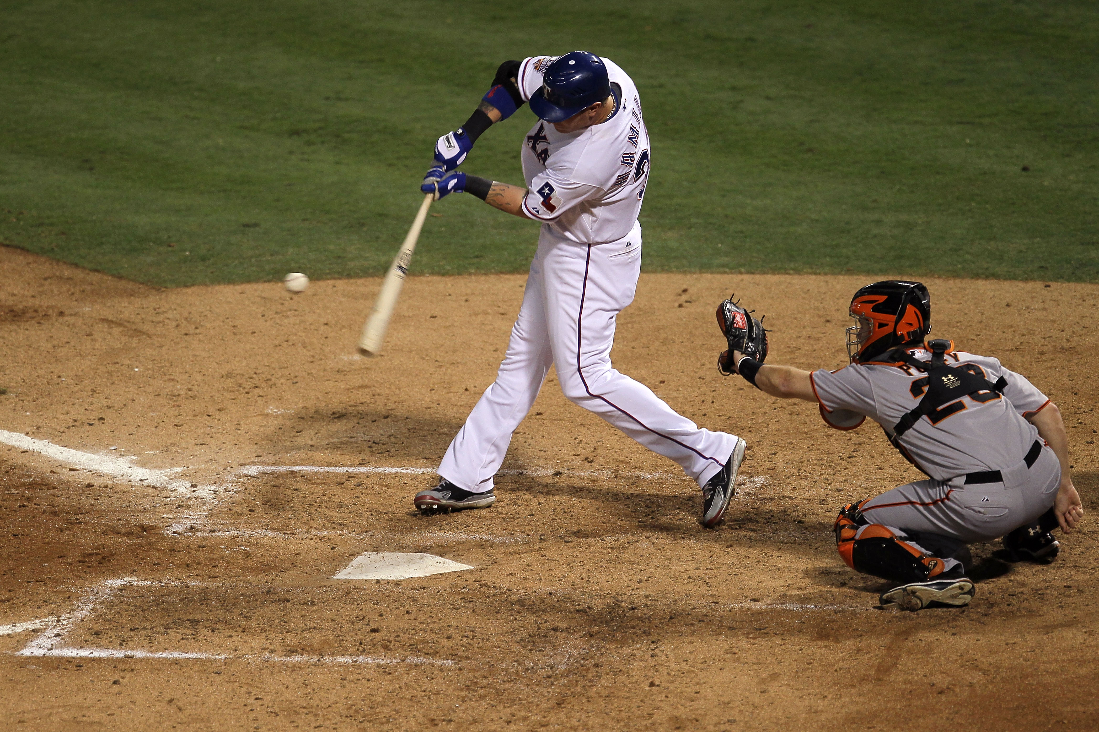 ARLINGTON, TX - OCTOBER 30:  Josh Hamilton #32 of the Texas Rangers hits a solo home run in the bottom of the fifht inning against the San Francisco Giants in Game Three of the 2010 MLB World Series at Rangers Ballpark in Arlington on October 30, 2010 in 