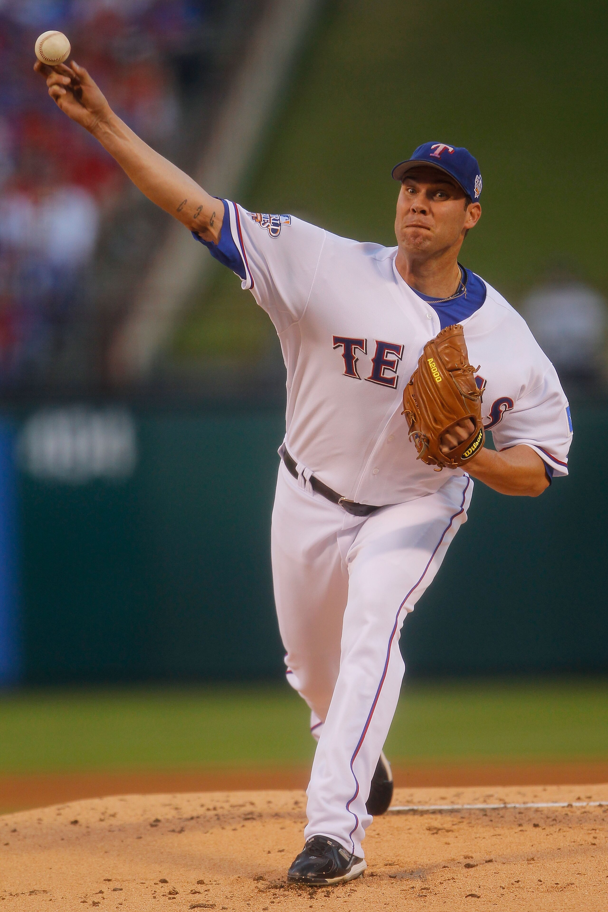 ARLINGTON, TX - OCTOBER 30:  Starting pitcher Colby Lewis #48 of the Texas Rangers pitches against the San Francisco Giants in Game Three of the 2010 MLB World Series at Rangers Ballpark in Arlington on October 30, 2010 in Arlington, Texas.  (Photo by Bri