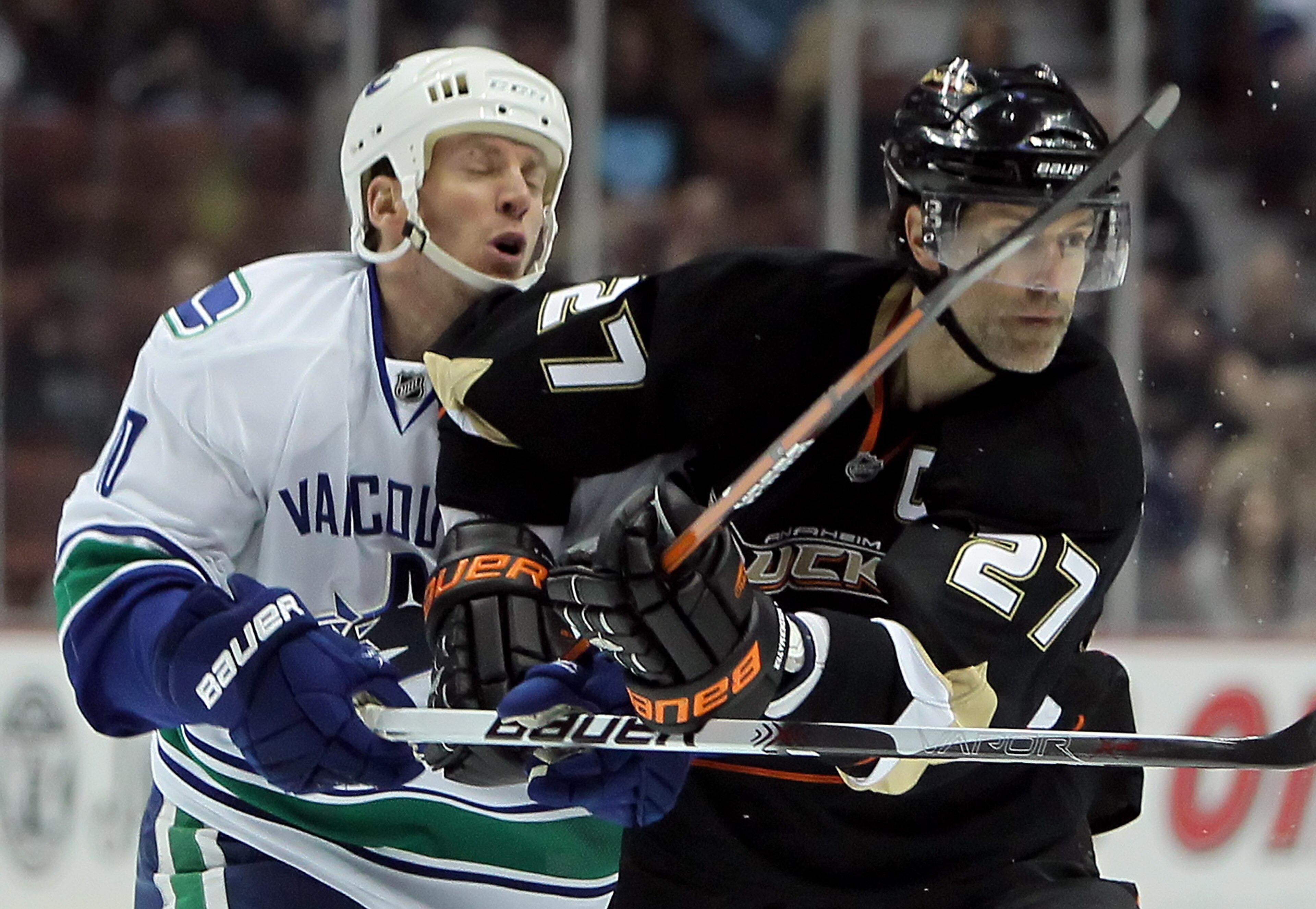 ANAHEIM, CA - APRIL 02: Ryan Johnson #10 of the Vancouver Canucks is elbowed by Scott Niedermayer #27 of the Anaheim Ducks in the first period at the Honda Center on April 2, 2010 in Anaheim, California. (Photo by Jeff Gross/Getty Images) ANAHEIM, CA - APRIL 02: Ryan Johnson #10 of the Vancouver Canucks is elbowed by Scott Niedermayer #27 of the Anaheim Ducks in the first period at the Honda Center on April 2, 2010 in Anaheim, California. (Photo by Jeff Gross/Getty Images)