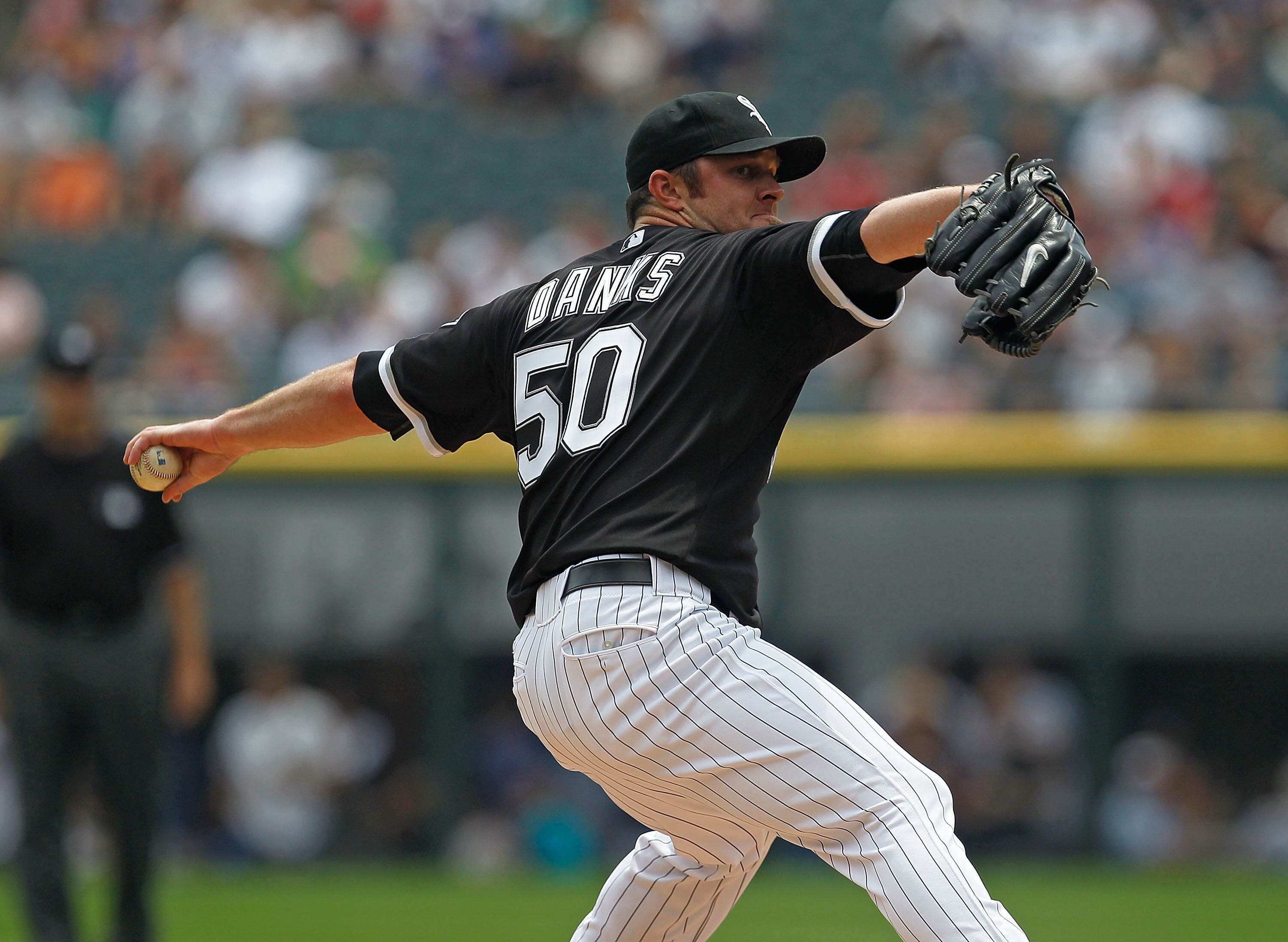 CHICAGO - JUNE 27: Starting pitcher John Danks #50 of the Chicago White Sox delivers the ball against the Chicago Cubs at U.S. Cellular Field on June 27, 2010 in Chicago, Illinois. (Photo by Jonathan Daniel/Getty Images)