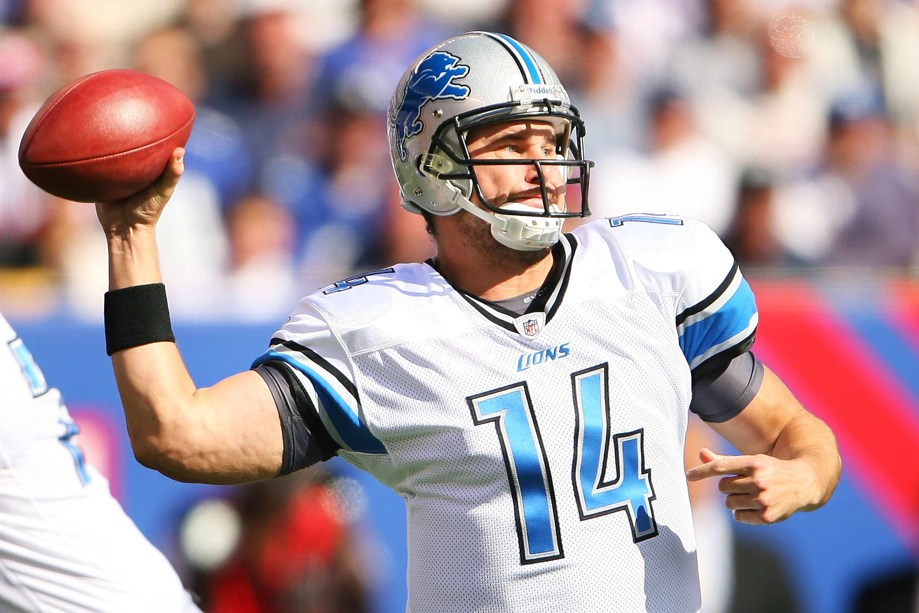 EAST RUTHERFORD, NJ - OCTOBER 17:  Shaun Hill #14 of the Detroit Lions drops back to pass against the New York Giants at New Meadowlands Stadium on October 17, 2010 in East Rutherford, New Jersey.  (Photo by Andrew Burton/Getty Images)