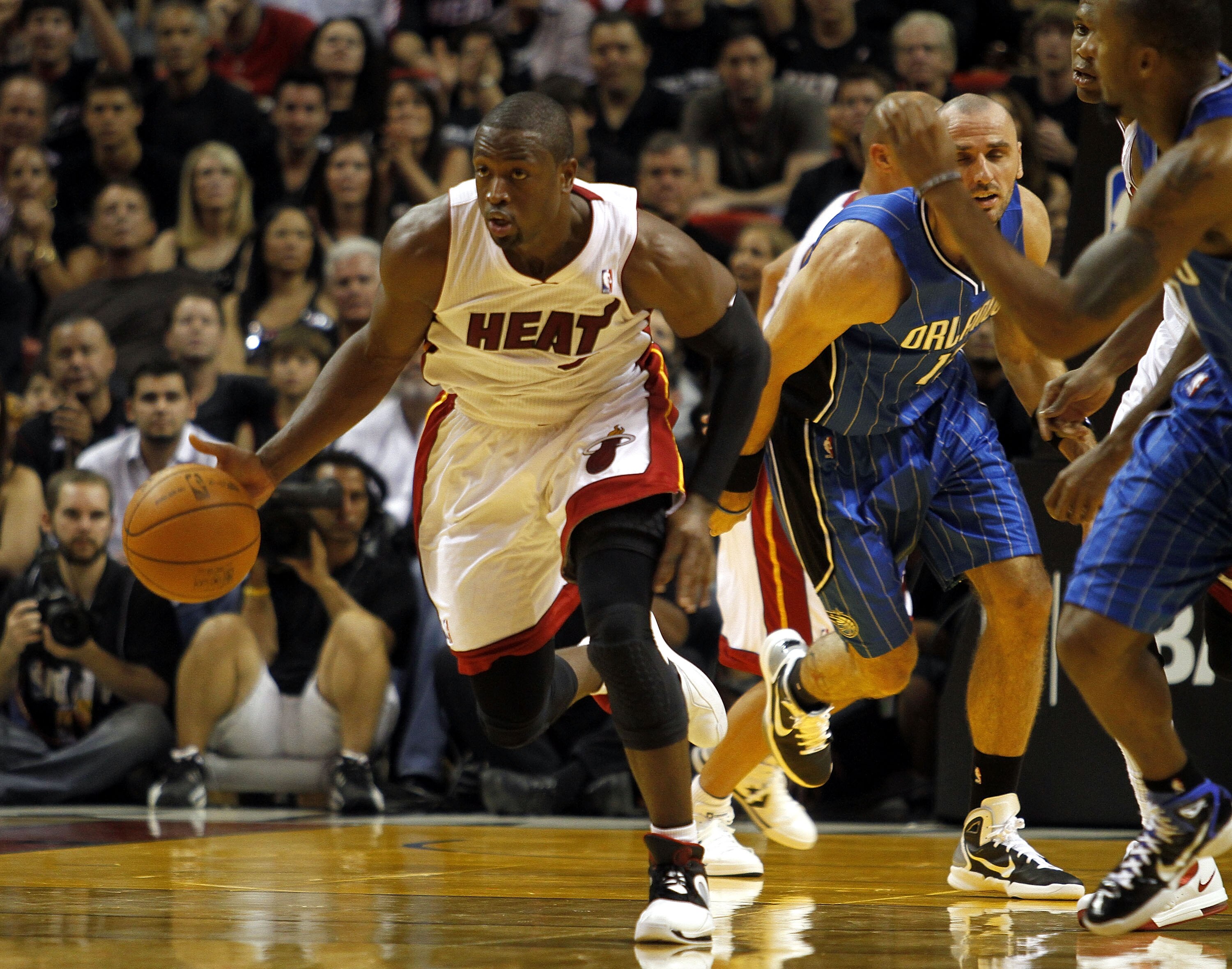 MIAMI - OCTOBER 29:  Guard Dwyane Wade #3 of  the Miami Heat brings up the ball against  the Orlando Magic at American Airlines Arena on October 29, 2010 in Miami, Florida.  NOTE TO USER: User expressly acknowledges and agrees that, by downloading and or 