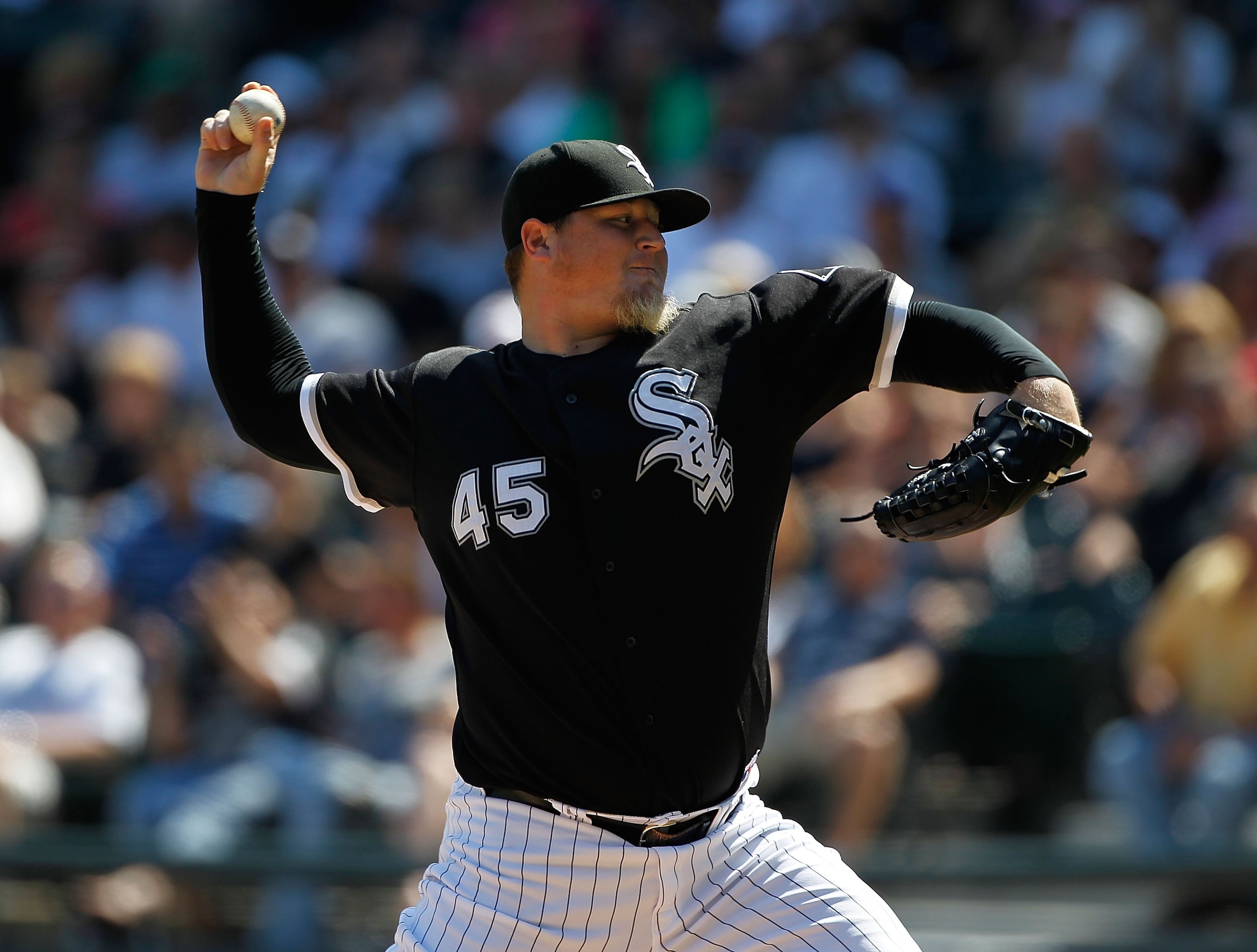 CHICAGO - JUNE 24: Bobby Jenks #45 of the Chicago White Sox pitches in the 9th inning against the Atlanta Braves to record a save at U.S. Cellular Field on June 24, 2010 in Chicago, Illinois. The White defeated the Braves 2-0. (Photo by Jonathan Daniel/Ge
