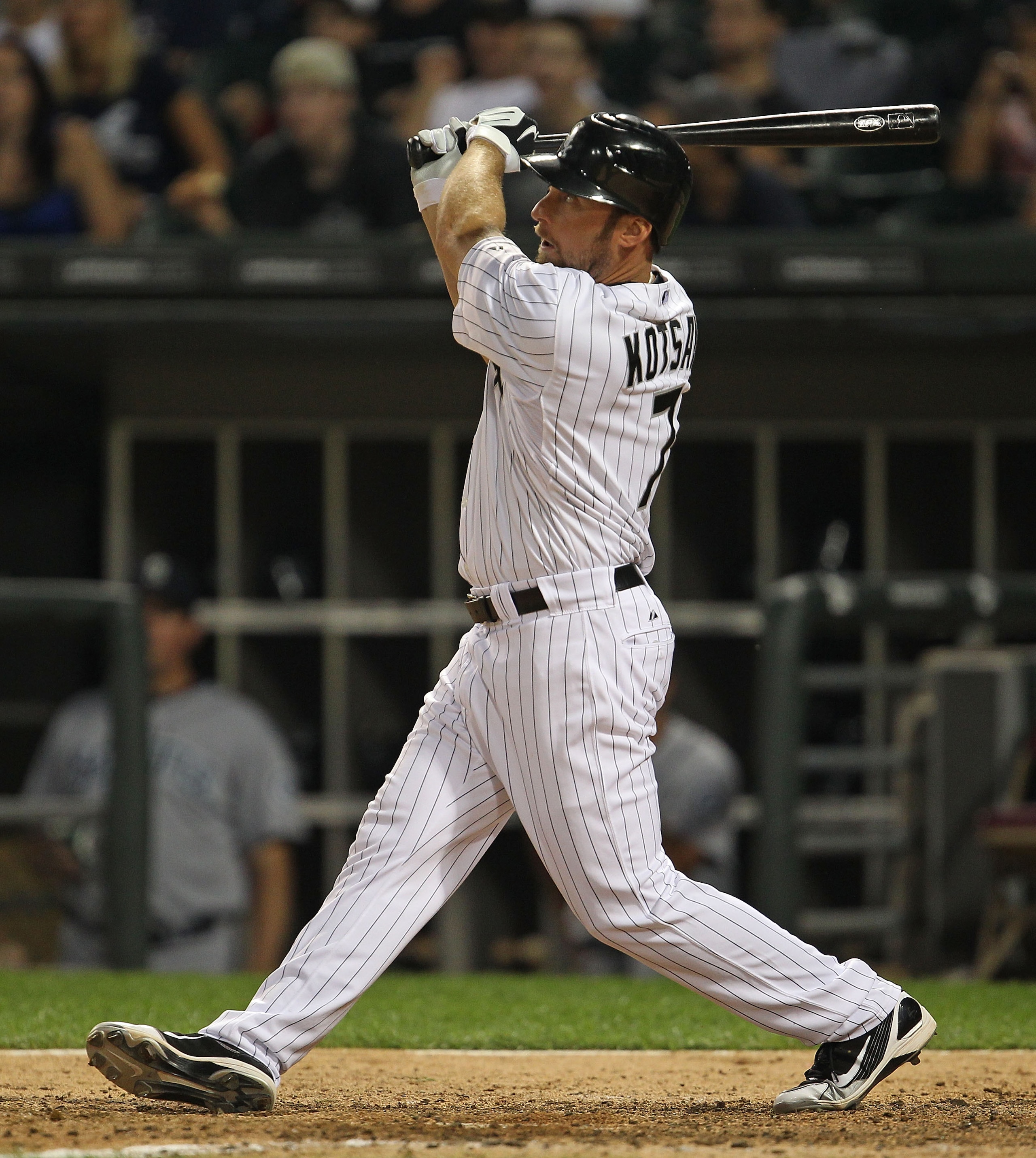 CHICAGO - JULY 26: Mark Kotsay of the Chicago White Sox hits the ball against the Seattle Mariners at U.S. Cellular Field on July 26, 2010 in Chicago, Illinois. The White Sox defeated the Mariners 6-1.  (Photo by Jonathan Daniel/Getty Images)