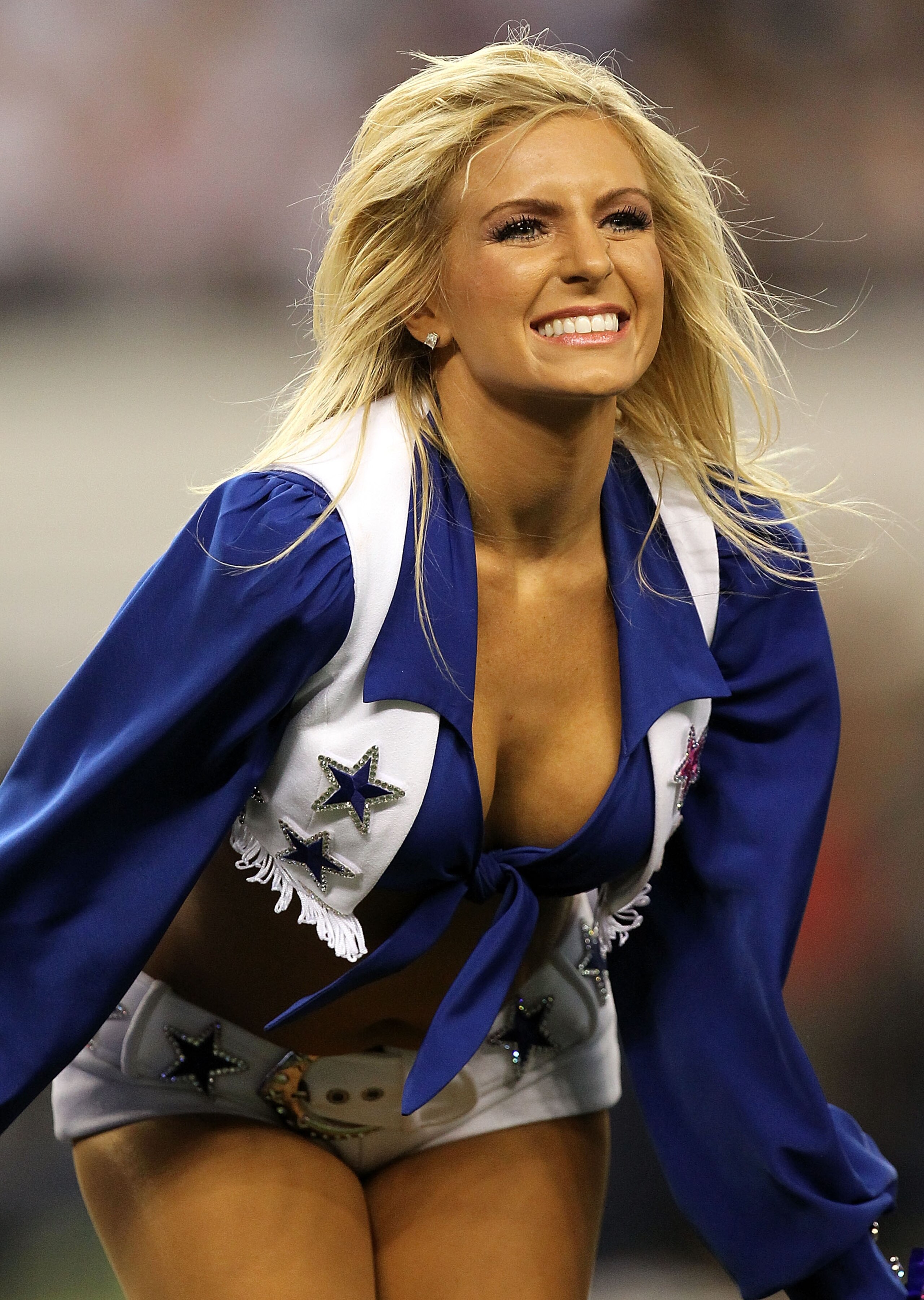 ARLINGTON, TX - OCTOBER 10:  A Dallas Cowboys cheerleader performs at Cowboys Stadium on October 10, 2010 in Arlington, Texas.  (Photo by Ronald Martinez/Getty Images)
