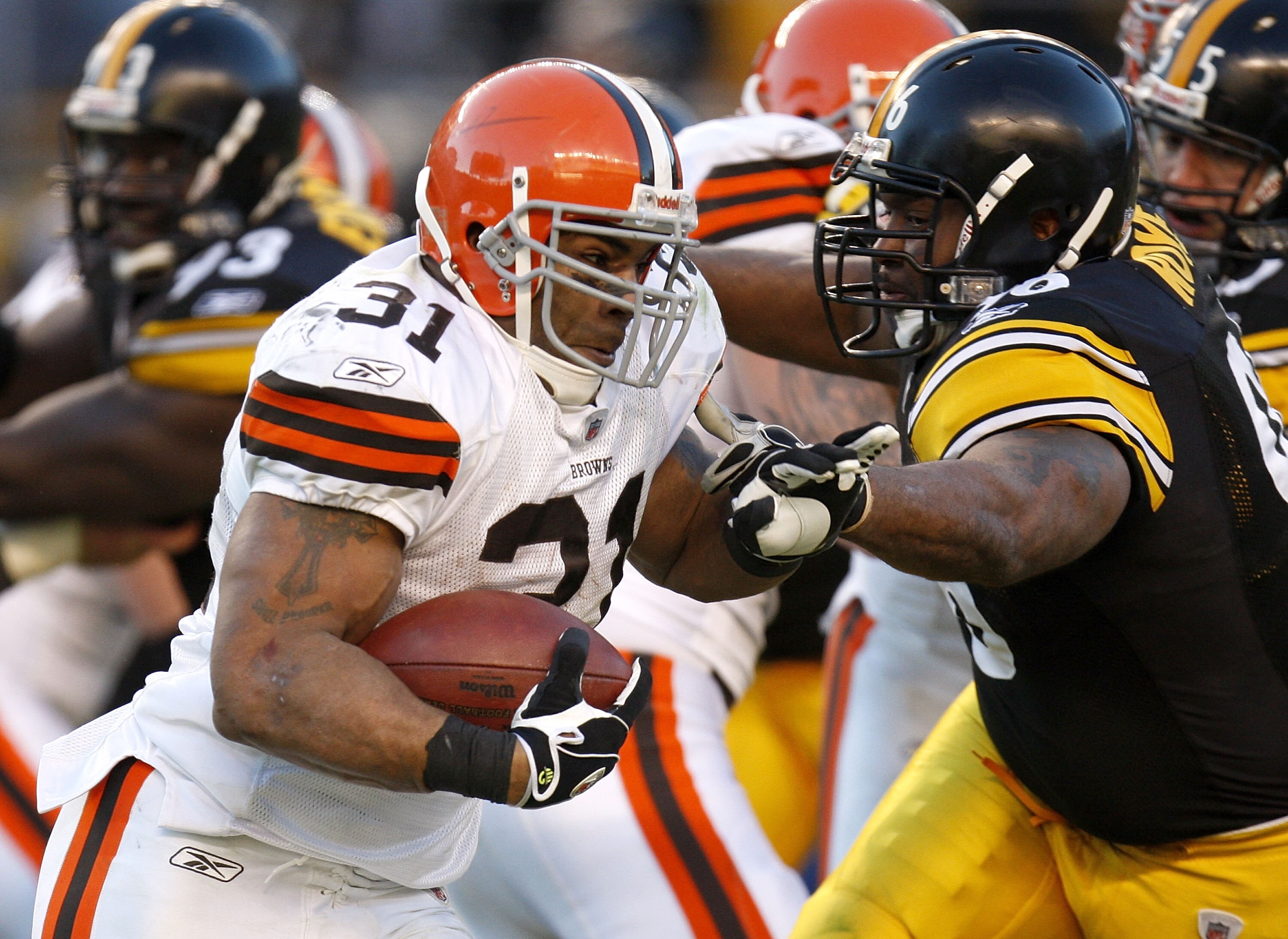 PITTSBURGH - DECEMBER 28:  Jamal Lewis #31 of the Cleveland Browns tries to get around the tackle of Orpheus Roye #96 of the Pittsburgh Steelers during a fourth quarter run at Heinz Field December 28, 2008 in Pittsburgh, Pennsylvania. Pittsburgh won the g