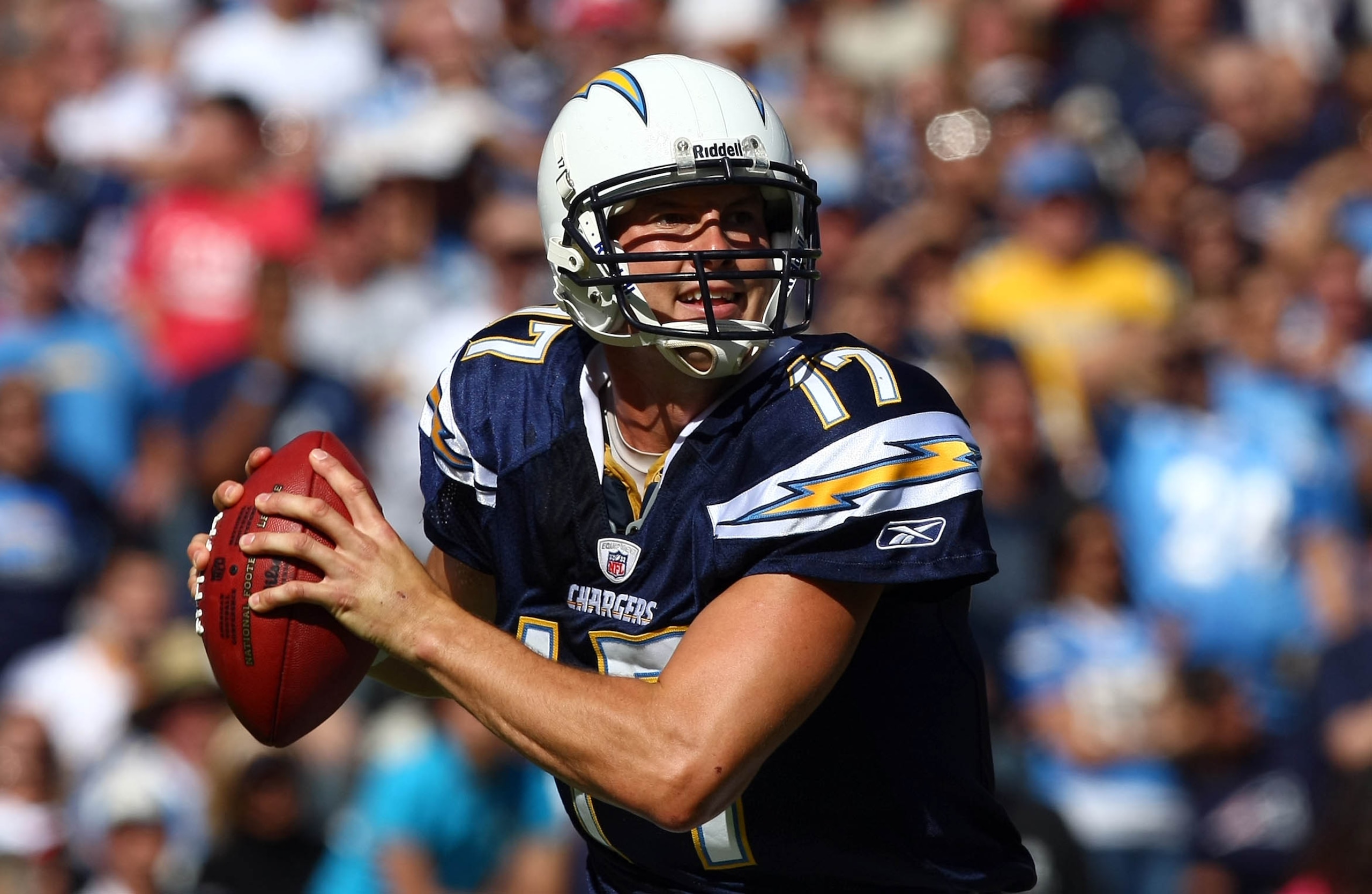 SAN DIEGO - OCTOBER 24: Quarterback Philip Rivers #17 of the San Diego Chargers rolls out of the pocket against the New England Patriots during NFL game on October 24, 2010 at Qualcomm Stadium in San Diego, California. (Photo by Donald Miralle/Getty Imag SAN DIEGO - OCTOBER 24: Quarterback Philip Rivers #17 of the San Diego Chargers rolls out of the pocket against the New England Patriots during NFL game on October 24, 2010 at Qualcomm Stadium in San Diego, California. (Photo by Donald Miralle/Getty Imag
