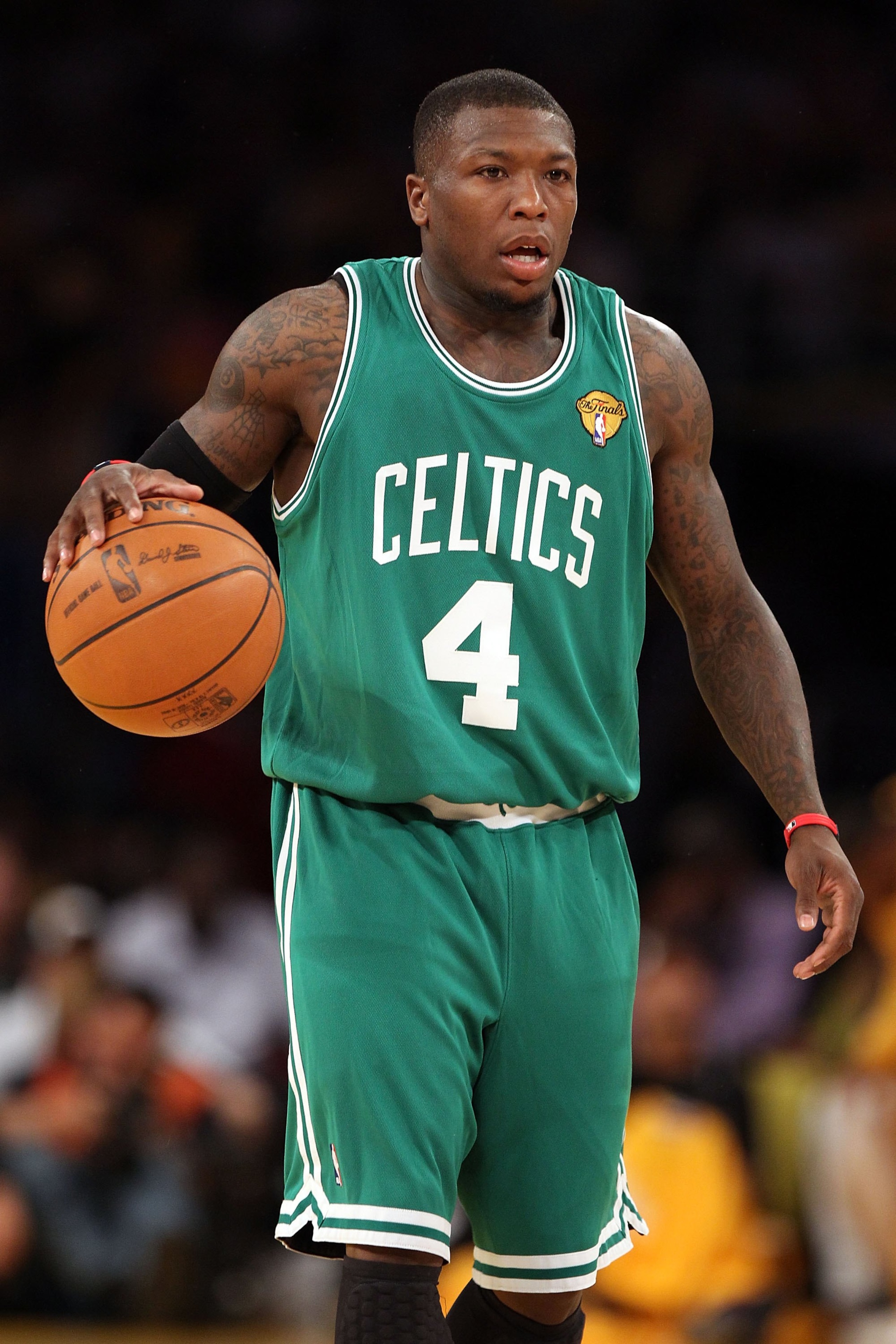 LOS ANGELES, CA - JUNE 15:  Nate Robinson #4 of the Boston Celtics moves the ball while taking on the Los Angeles Lakers in Game Six of the 2010 NBA Finals at Staples Center on June 15, 2010 in Los Angeles, California.  NOTE TO USER: User expressly acknow