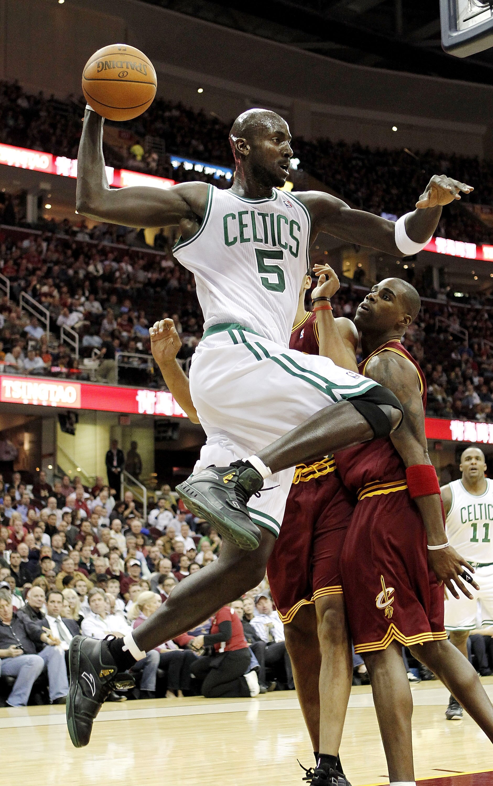 CLEVELAND - OCTOBER 27:  Kevin Garnett #5 of the Boston Celtics looks to pass to a teammate next to Antawn Jamison #4 of the Cleveland Cavaliers at Quicken Loans Arena on October 27, 2010 in Cleveland, Ohio.  (Photo by Gregory Shamus/Getty Images)