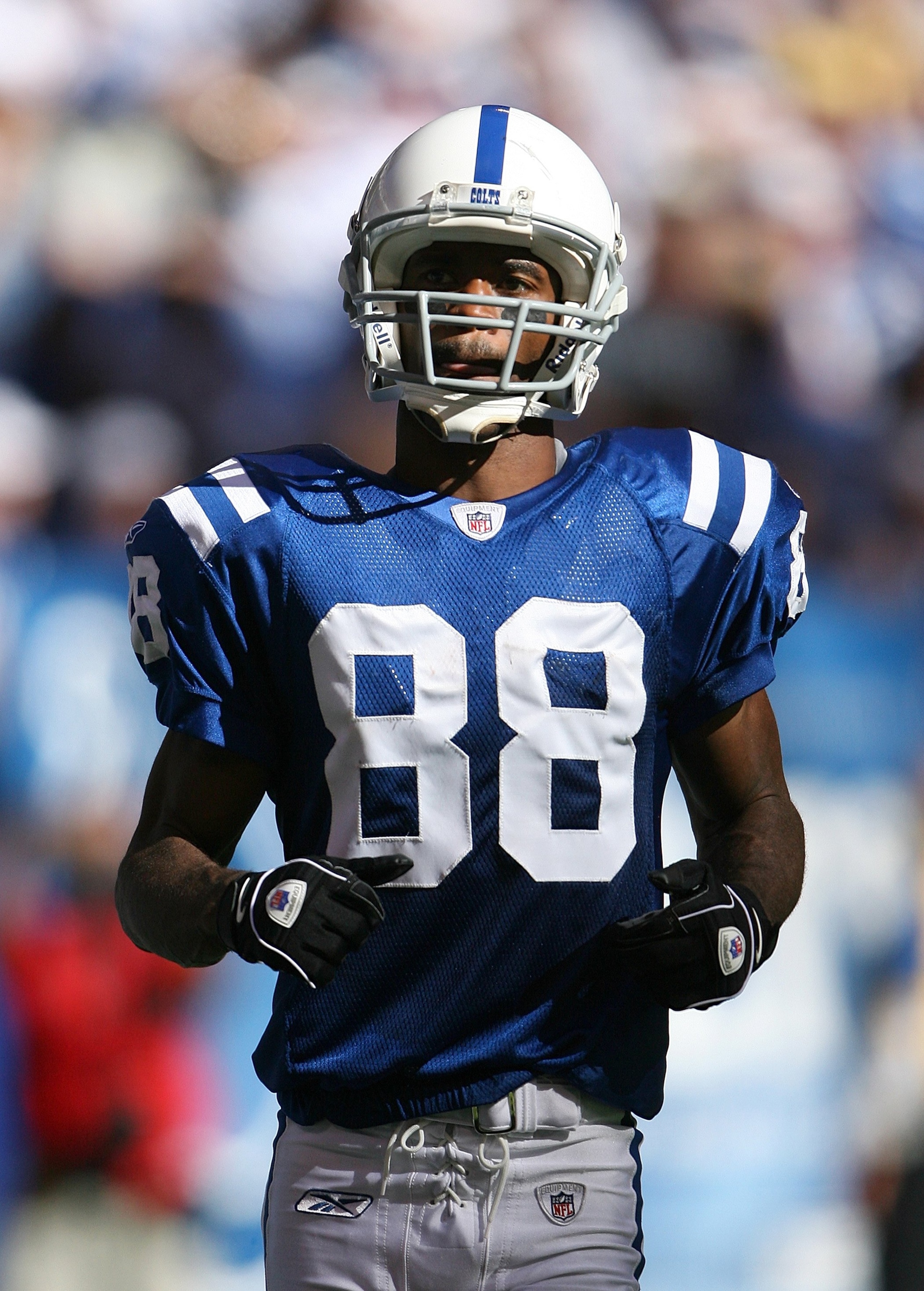 INDIANAPOLIS - OCTOBER 12:  Marvin Harrison #88 of the Indianapolis Colts jogs on the field during the NFL game against the Baltimore Ravens at Lucas Oil Stadium on October 12, 2008 in Indianapolis, Indiana. The Colts defeated the Ravens 31-3. (Photo by A