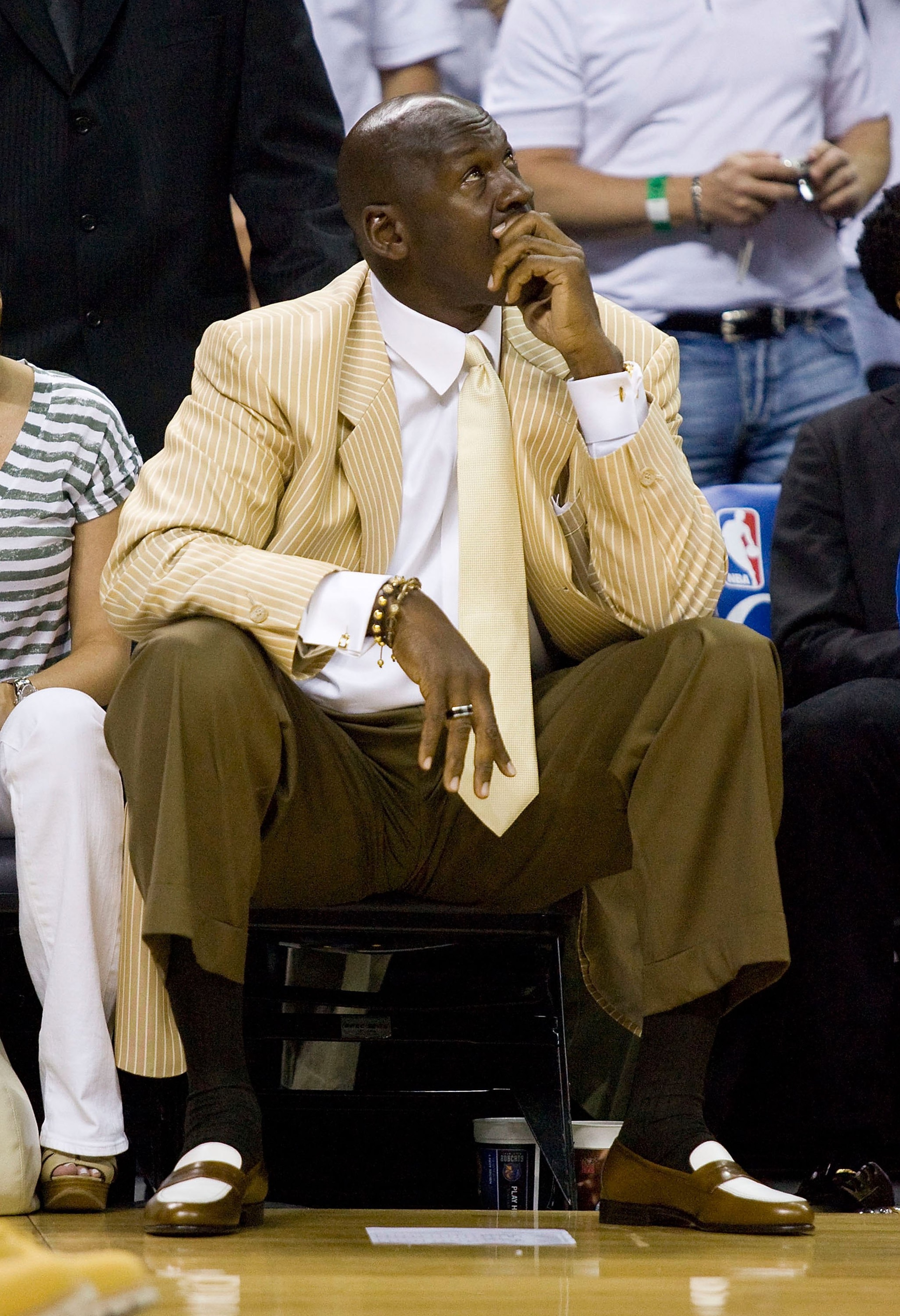 CHARLOTTE, NC - APRIL 26: Charlotte Bobcats owner Michael Jordan looks at the video board during the game against the Orlando Magic at Time Warner Cable Arena on April 26, 2010 in Charlotte, North Carolina.  The Magic defeated the Bobcats 99-90 to complet