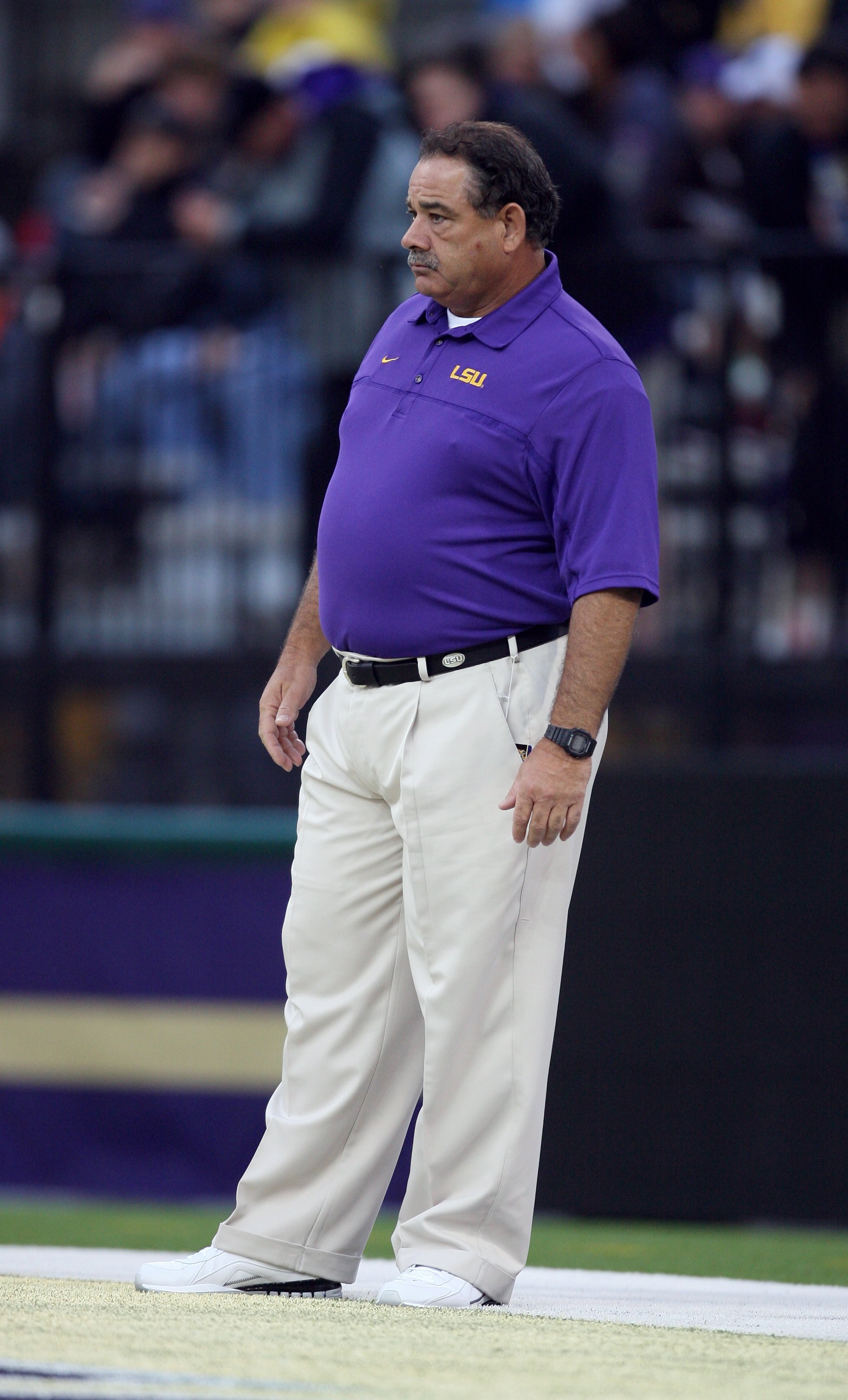 SEATTLE - SEPTEMBER 5: Defensive coordinator John Chavis of the LSU Tigers looks on during pre-game warm-up against the Washington Huskies on September 5, 2009 at Husky Stadium in Seattle, Washington. The LSU Tigers defeated the Washington Huskies 31-23. SEATTLE - SEPTEMBER 5: Defensive coordinator John Chavis of the LSU Tigers looks on during pre-game warm-up against the Washington Huskies on September 5, 2009 at Husky Stadium in Seattle, Washington. The LSU Tigers defeated the Washington Huskies 31-23.
