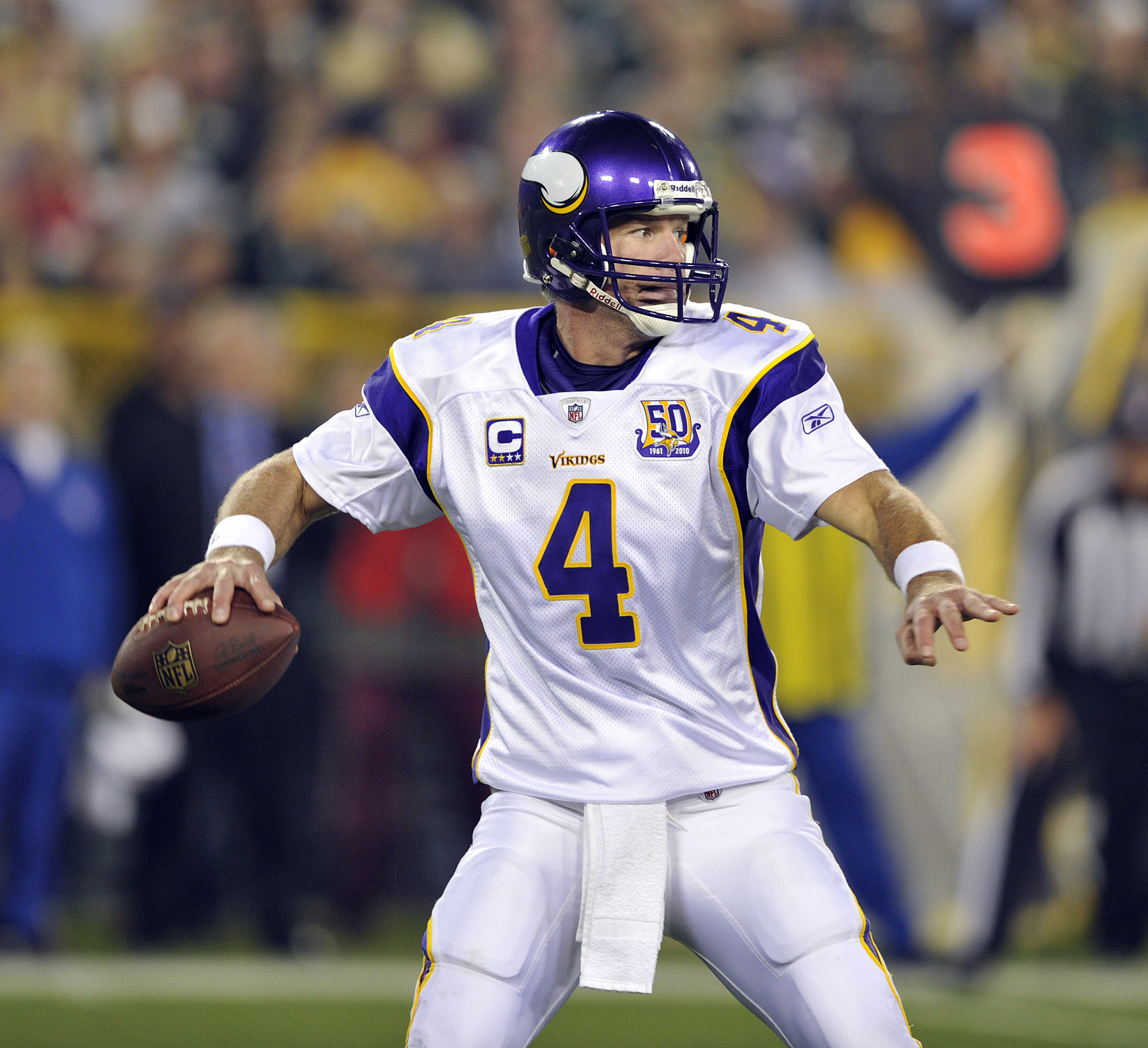 GREEN BAY, WI - OCTOBER 24:   Brett Favre #4 of the Minnesota Vikings passes against the Green Bay Packers at Lambeau Field on October 24, 2010 in Green Bay, Wisconsin. (Photo by Jim Prisching/Getty Images)