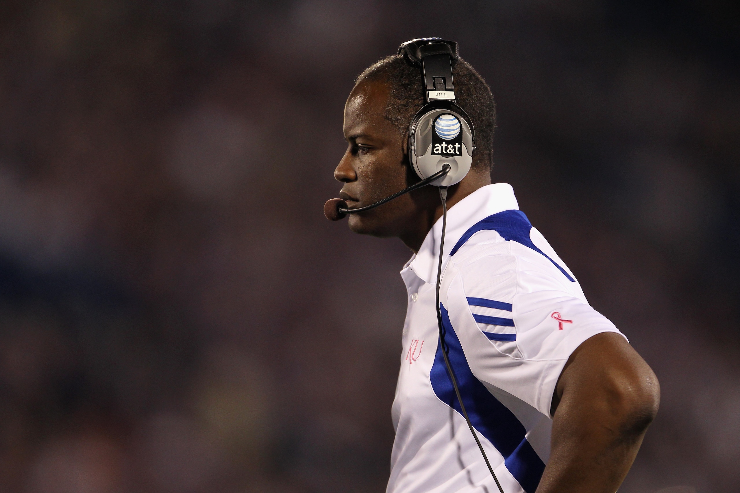 LAWRENCE, KS - OCTOBER 14:  Head coach Turner Gill of the Kansas Jayhawks watches from the sidelines during the game against the Kansas State Wildcats on October 14, 2010 at Memorial Stadium in Lawrence, Kansas.  (Photo by Jamie Squire/Getty Images)