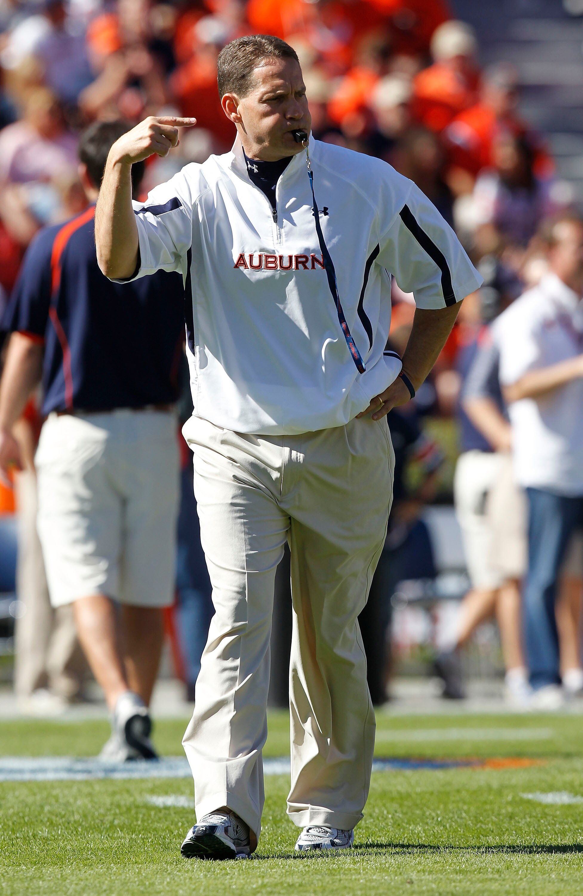 AUBURN, AL - OCTOBER 16:  Auburn head coach Gene Chizik blows his whistle during warm ups before the game against the Arkansas Razorbacks at Jordan-Hare Stadium on October 16, 2010 in Auburn, Alabama.  (Photo by Mike Zarrilli/Getty Images)
