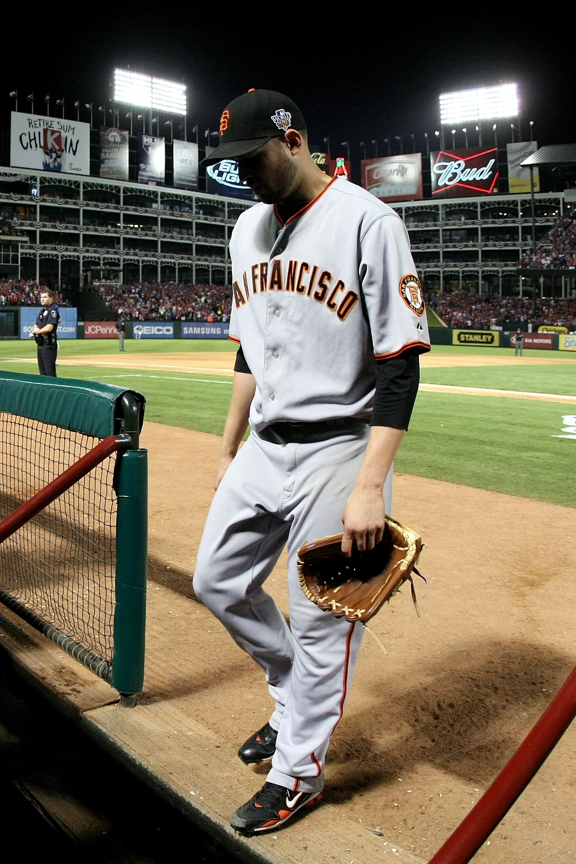 ARLINGTON, TX - OCTOBER 30:  Starting pitcher Jonathan Sanchez #57 of the San Francisco Giants walks into the dugout dejected after he was taken out of the game in the bottom of the fifth inning against the Texas Rangers in Game Three of the 2010 MLB Worl