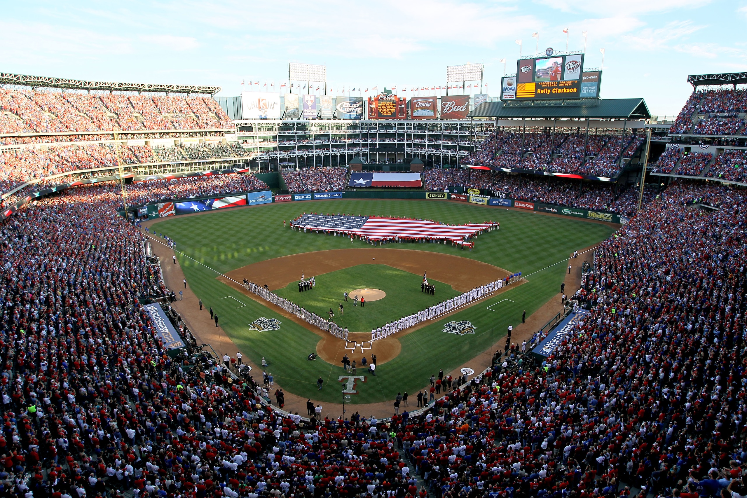 ARLINGTON, TX - OCTOBER 30:  A general view of a giant American Flag stretched across the ouitfield during pregame festivities between the Texas Rangers and the San Francisco Giants in Game Three of the 2010 MLB World Series at Rangers Ballpark in Arlingt