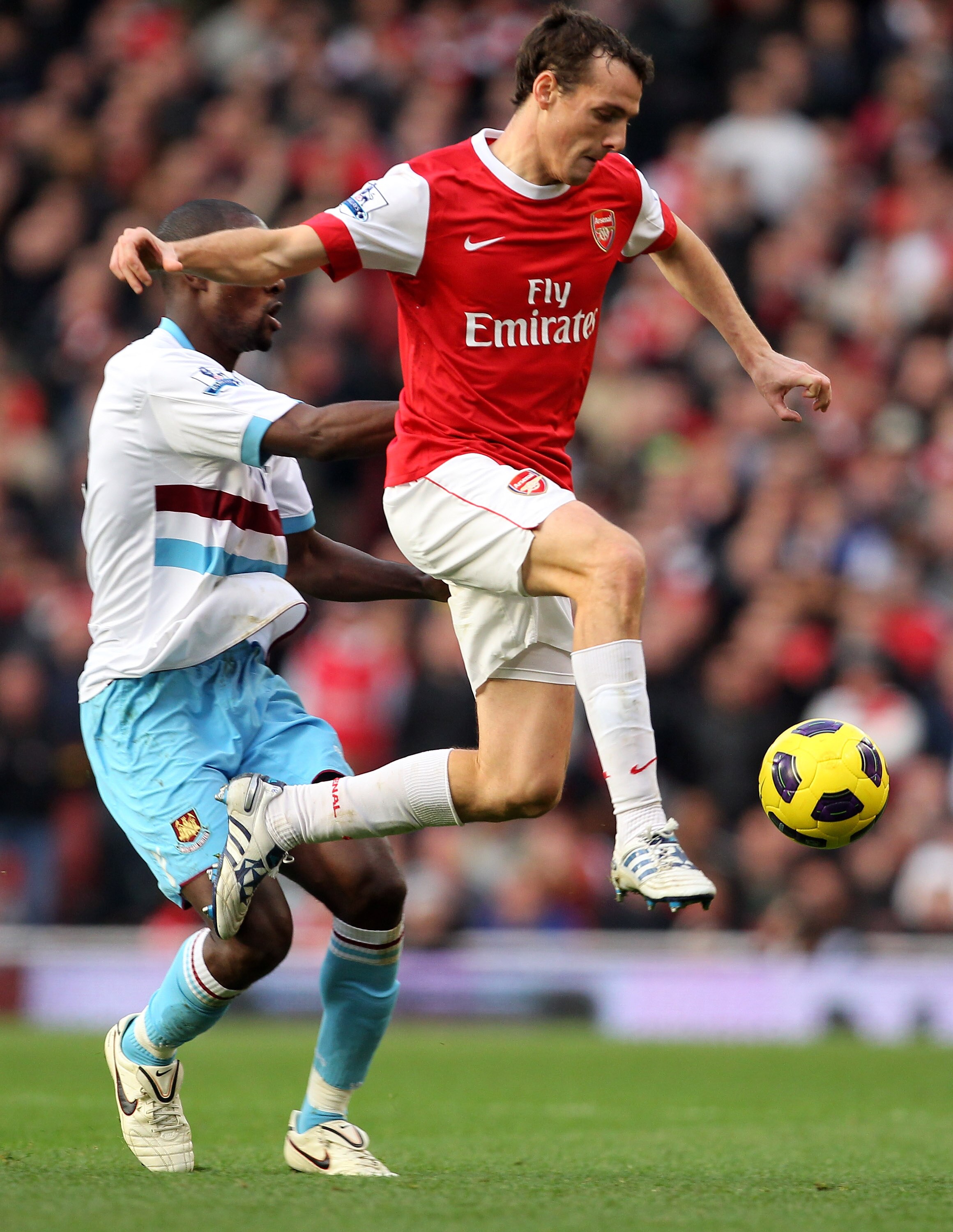 LONDON, ENGLAND - OCTOBER 30: Sebastien Squillaci of Arsenal on the ball during the Barclays Premier League match between Arsenal and West Ham United at Emirates Stadium on October 30, 2010 in London, England.  (Photo by Clive Rose/Getty Images)