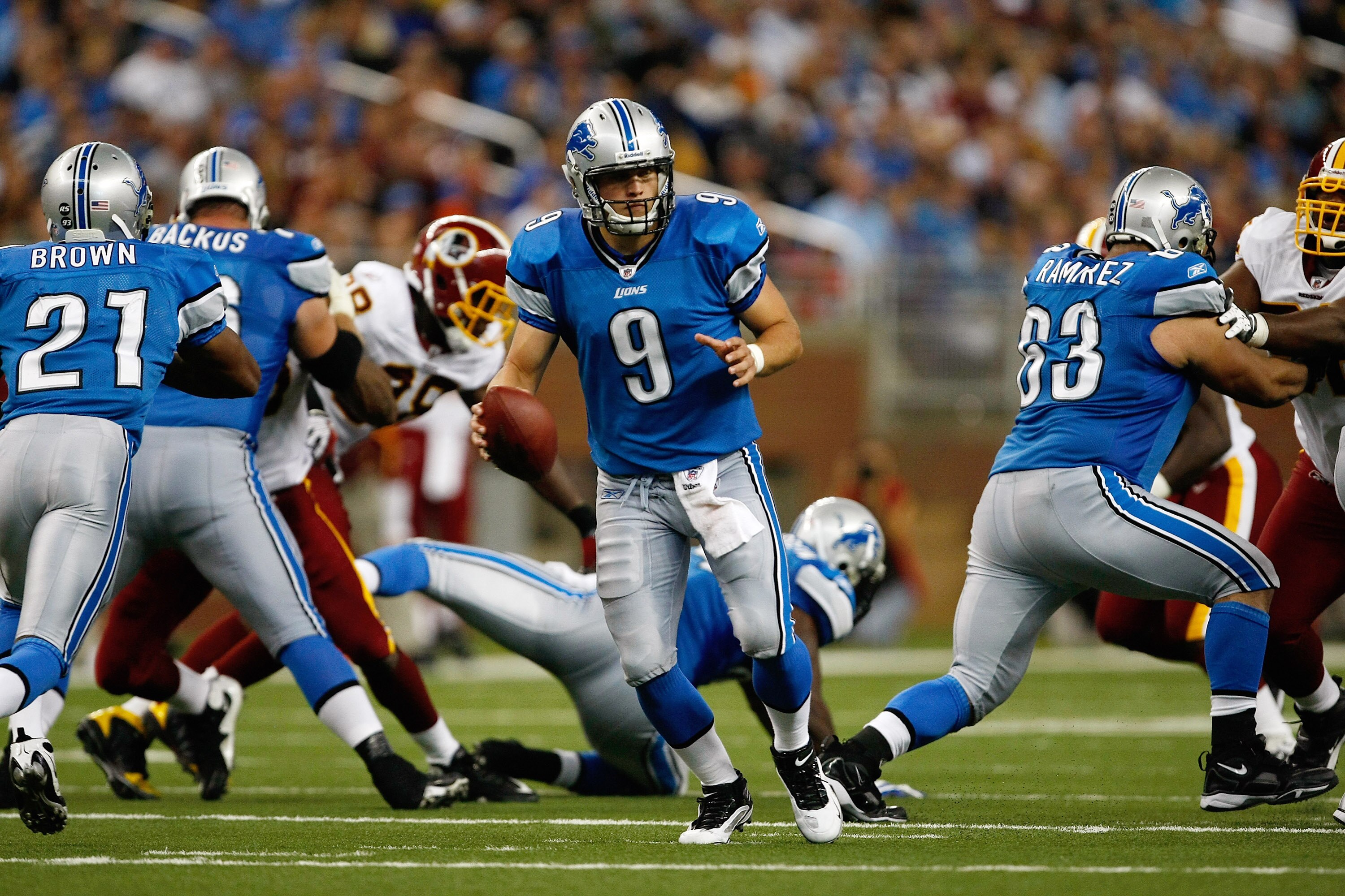 DETROIT, MI - SEPTEMBER 27: Quarterback Matthew Stafford #9 of the Detroit Lions runs with the football against the Washington Redskins at Ford Field on September 27, 2009 in Detroit, Michigan. The Lions defeated the Redskins 19-14. (Photo by Scott Boehm/