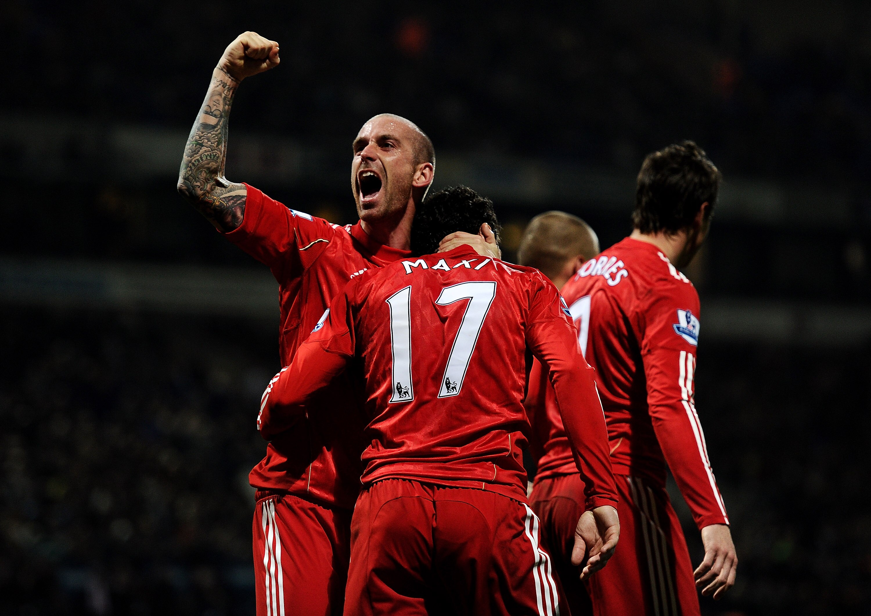 BOLTON, ENGLAND - OCTOBER 31:   Raul Meireles celebrates after Maxi Rodriguez of Liverpool scored the winning goal during the Barclays Premier League match between Bolton Wanderers and Liverpool at the Reebok Stadium on October 31, 2010 in Bolton, England