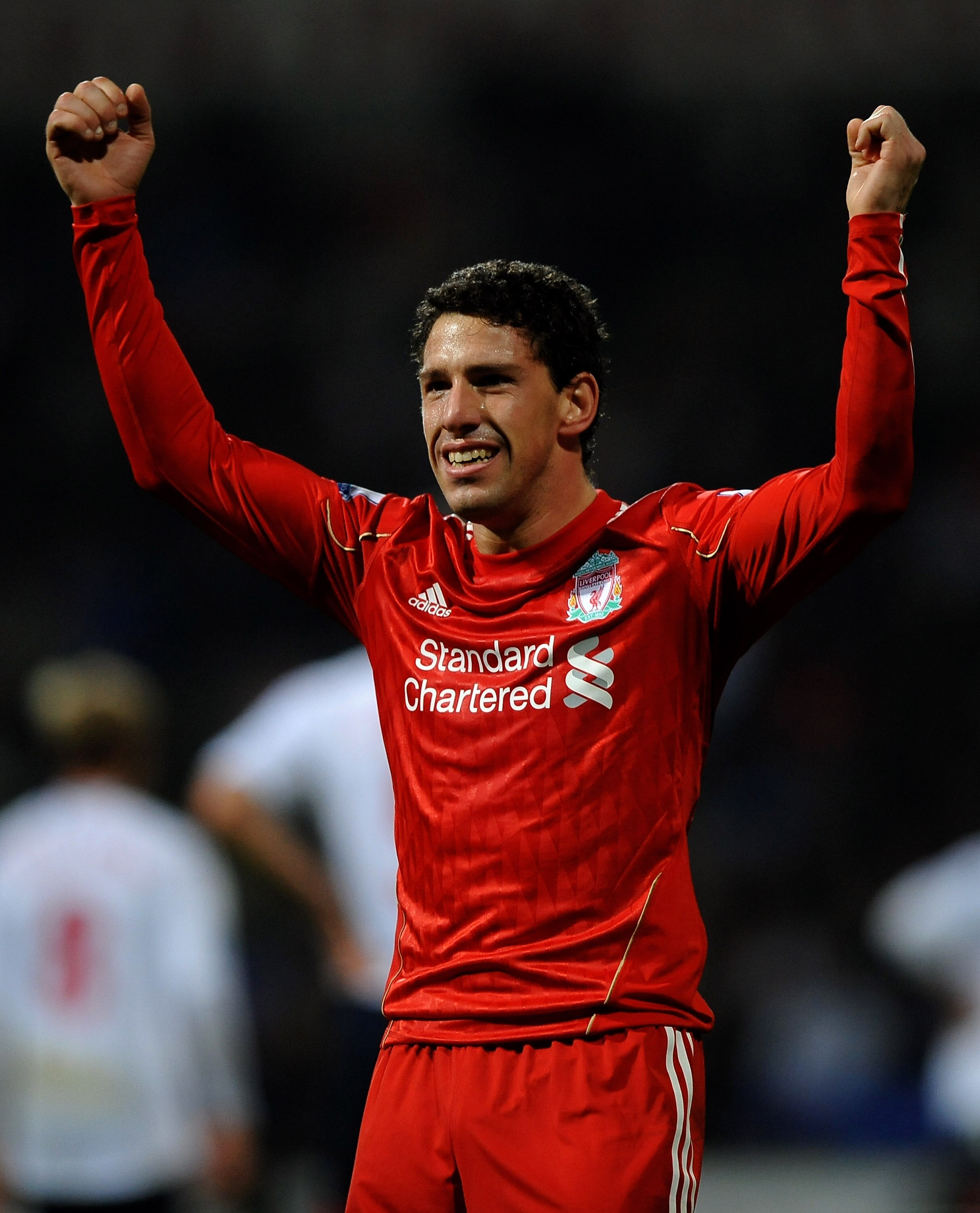 BOLTON, ENGLAND - OCTOBER 31:  Maxi Rodriguez of Liverpool celebrates scoring the opening goal during the Barclays Premier League match between Bolton Wanderers and Liverpool at the Reebok Stadium on October 31, 2010 in Bolton, England. (Photo by Laurence