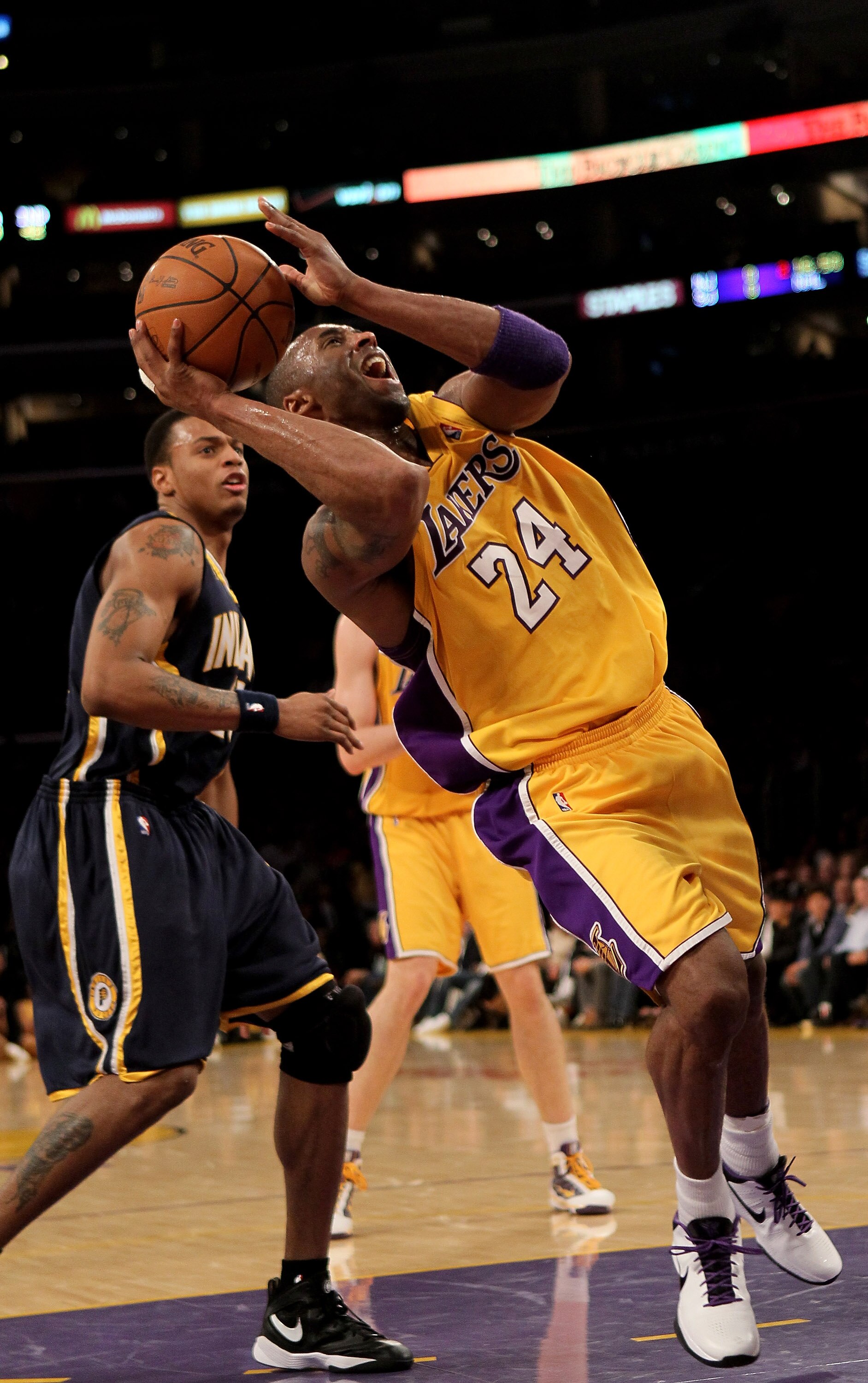 LOS ANGELES, CA - MARCH 02:  Kobe Bryant #24 of the Los Angeles Lakers throws up a shot after being fouled against the Indiana Pacers on March 2, 2010 at Staples Center in Los Angeles, California.   The Lakers won 122-99.  NOTE TO USER: User expressly ack