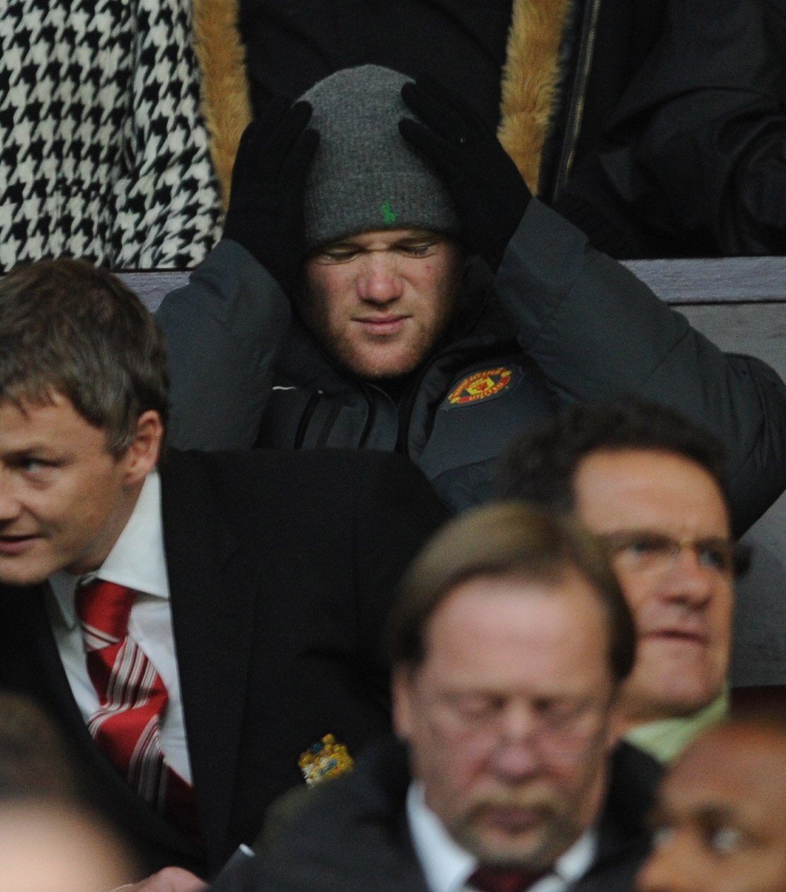 MANCHESTER, ENGLAND - OCTOBER 30:  Wayne Rooney of Manchester United in the stands during the Barclays Premier League match between Manchester United and Tottenham Hotspur at Old Trafford on October 30, 2010 in Manchester, England.  (Photo by Michael Rega