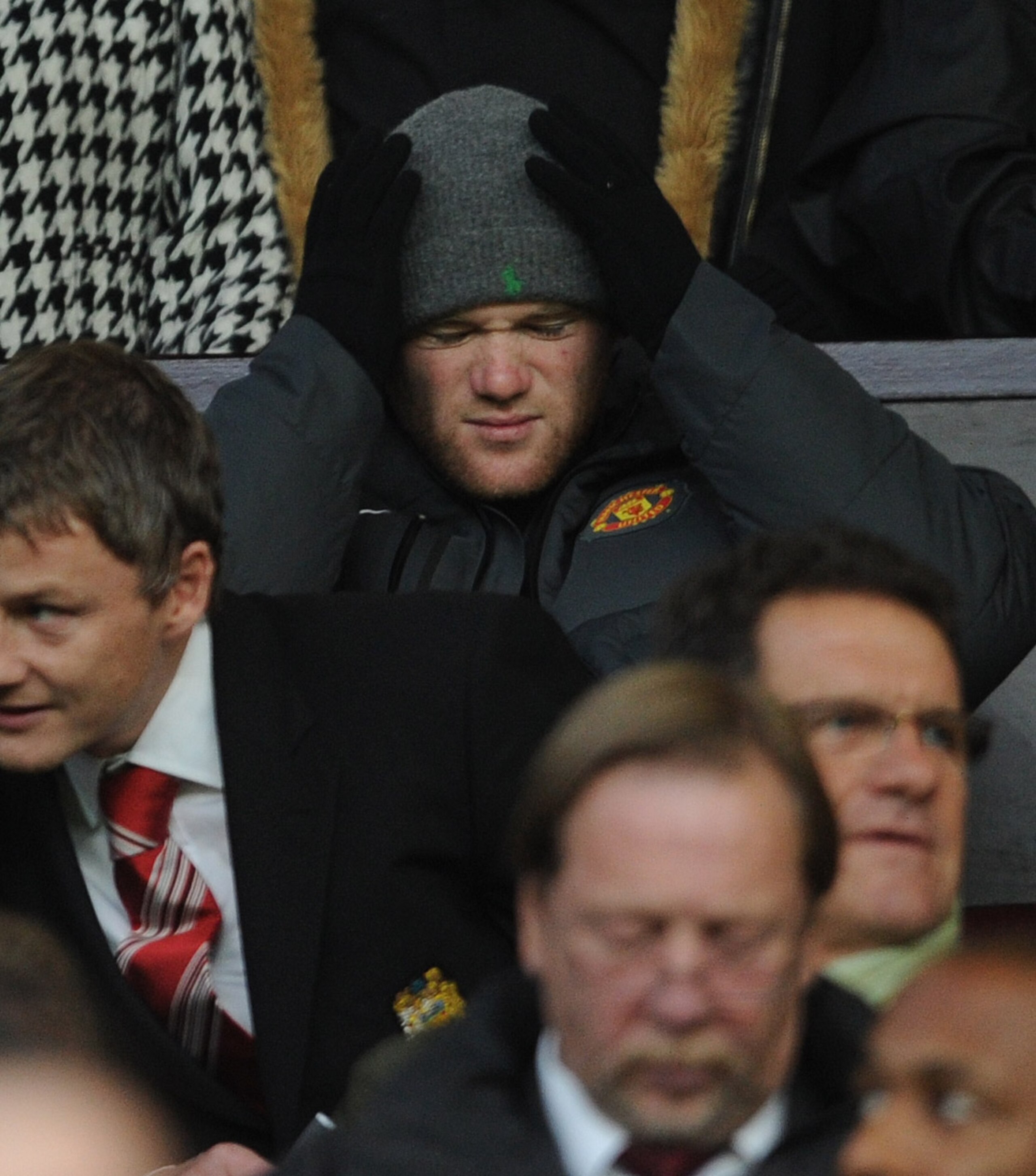 MANCHESTER, ENGLAND - OCTOBER 30:  Wayne Rooney of Manchester United in the stands during the Barclays Premier League match between Manchester United and Tottenham Hotspur at Old Trafford on October 30, 2010 in Manchester, England.  (Photo by Michael Rega