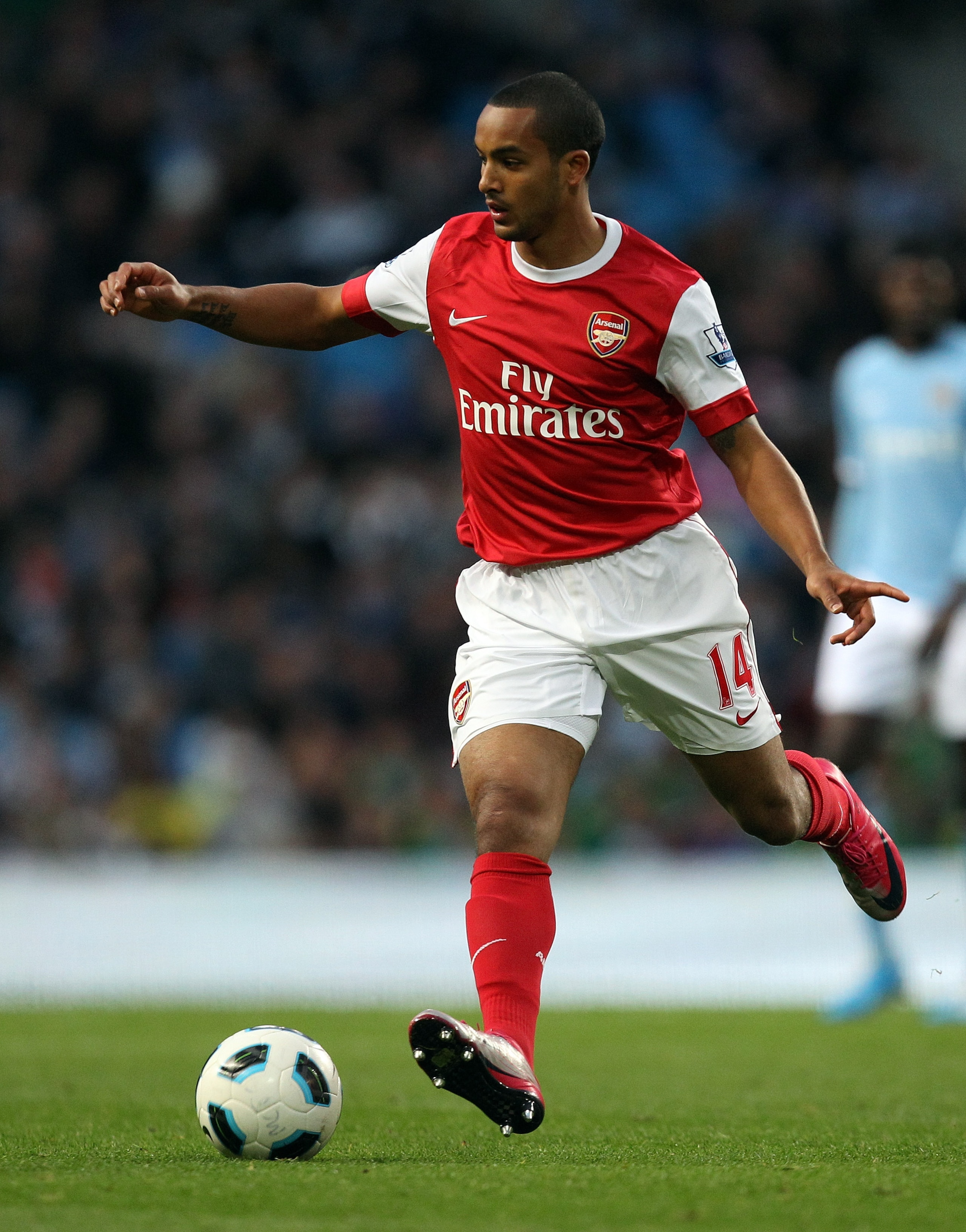 MANCHESTER, ENGLAND - OCTOBER 24:  Theo Walcott of Arsenal in action during the Barclays Premier League match between Manchester City and Arsenal at City of Manchester Stadium on October 24, 2010 in Manchester, England.  (Photo by Richard Heathcote/Getty