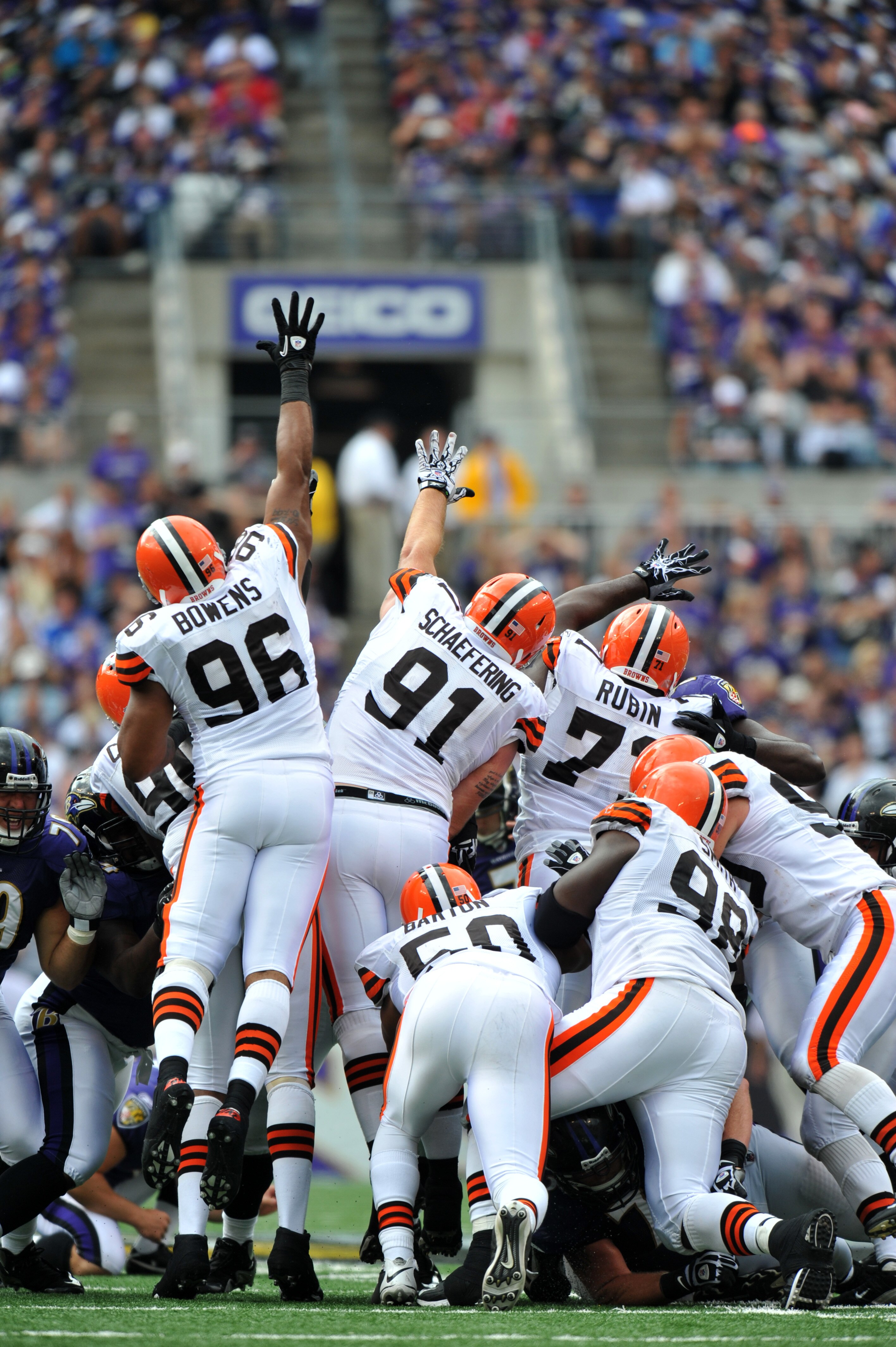 BALTIMORE - SEPTEMBER 26:  David Bowens #96 and Brian Schaefering #91 of the Cleveland Browns try to block a field goal by the Baltimore Ravens  at M&T Bank Stadium on September 26, 2010 in Baltimore, Maryland. The Ravens defeated the Browns 24-17. (Photo