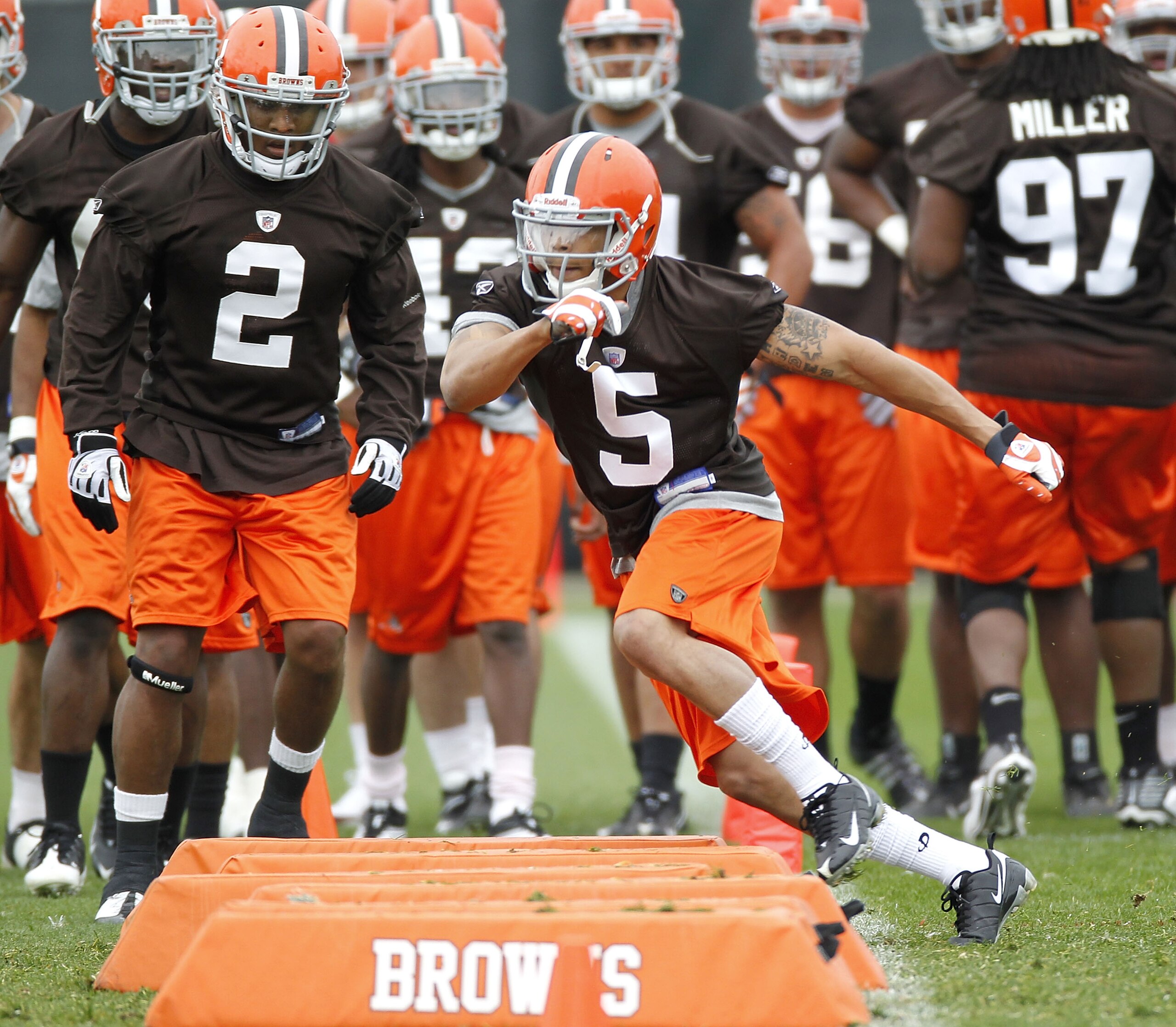 BEREA, OH - MAY 01:  T.J. Ward #2 and Joe Haden #5 of the Cleveland Browns run through a drill during rookie mini camp at the Cleveland Browns Training and Administrative Complex on May 1, 2010 in Berea, Ohio.  (Photo by Gregory Shamus/Getty Images)