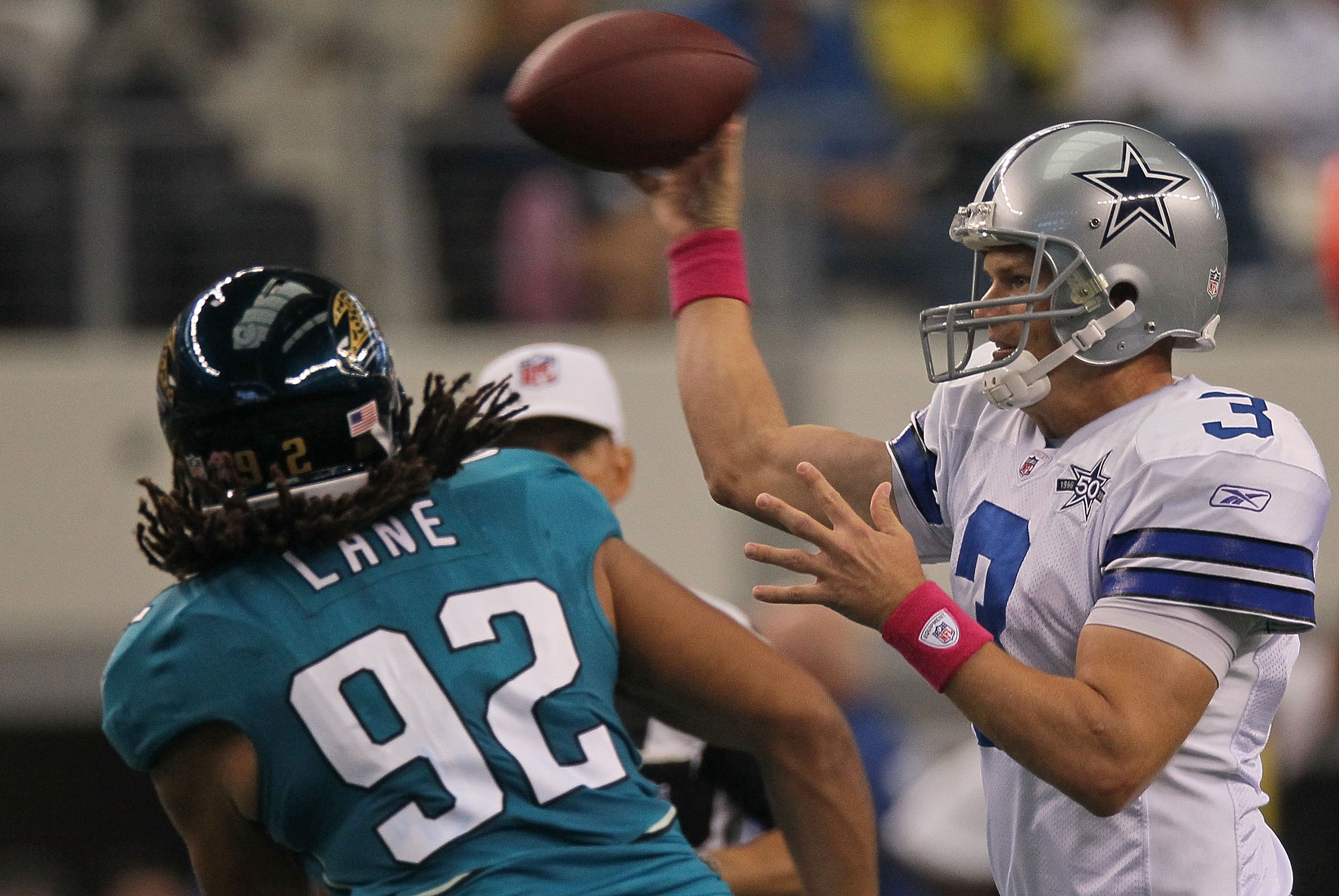 ARLINGTON, TX - OCTOBER 31:  Quarterback Jon Kitna #3 of the Dallas Cowboys throws the ball in front of Austen Lane #92 of the Jacksonville Jaguars at Cowboys Stadium on October 31, 2010 in Arlington, Texas.  (Photo by Stephen Dunn/Getty Images)