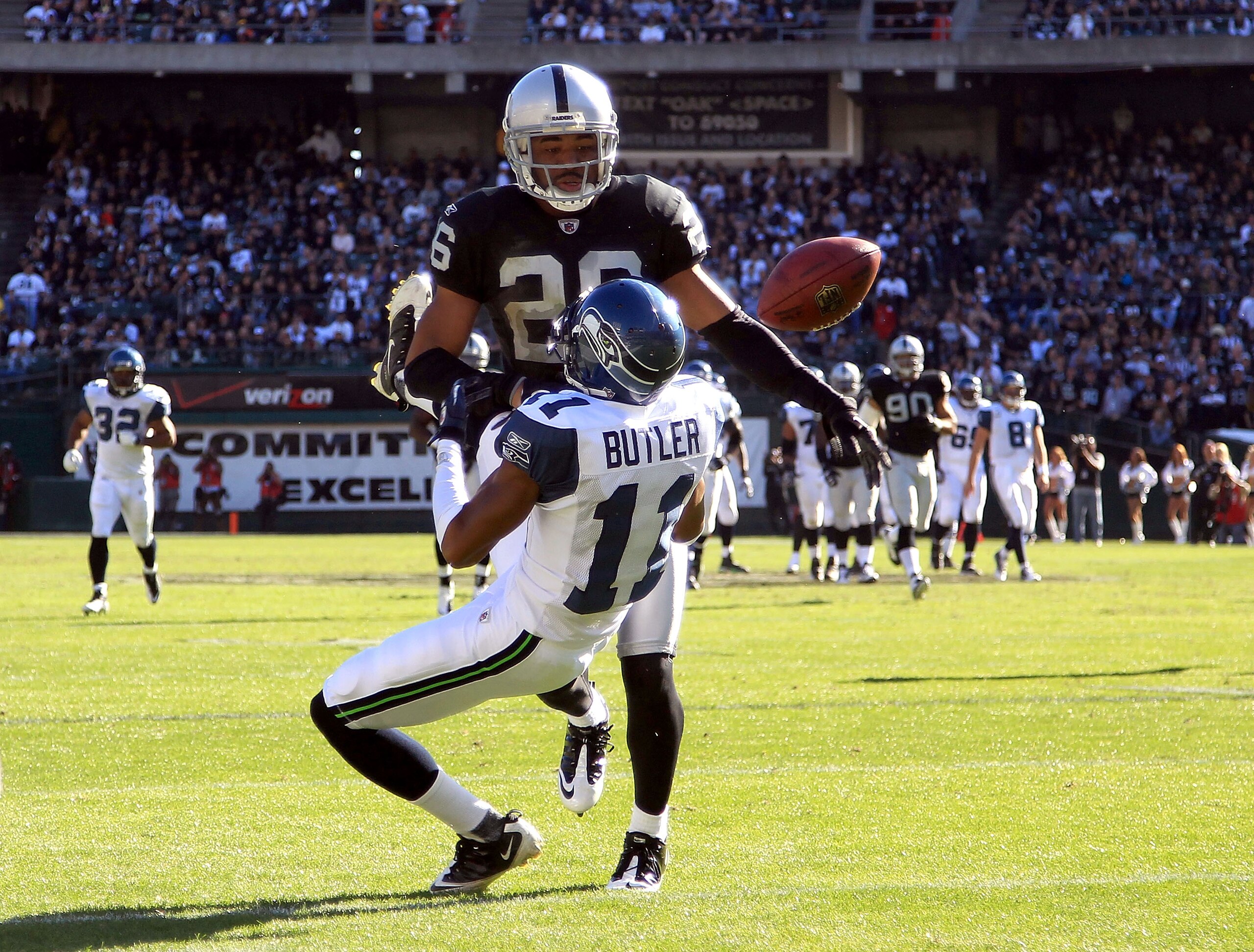OAKLAND, CA - OCTOBER 31: Stanford Routt #26 of the Oakland Raiders knocks the ball away from Deon Butler #11 of the Seattle Seahawks at Oakland-Alameda County Coliseum on October 31, 2010 in Oakland, California. Routt was called for pass interference on OAKLAND, CA - OCTOBER 31: Stanford Routt #26 of the Oakland Raiders knocks the ball away from Deon Butler #11 of the Seattle Seahawks at Oakland-Alameda County Coliseum on October 31, 2010 in Oakland, California. Routt was called for pass interference on