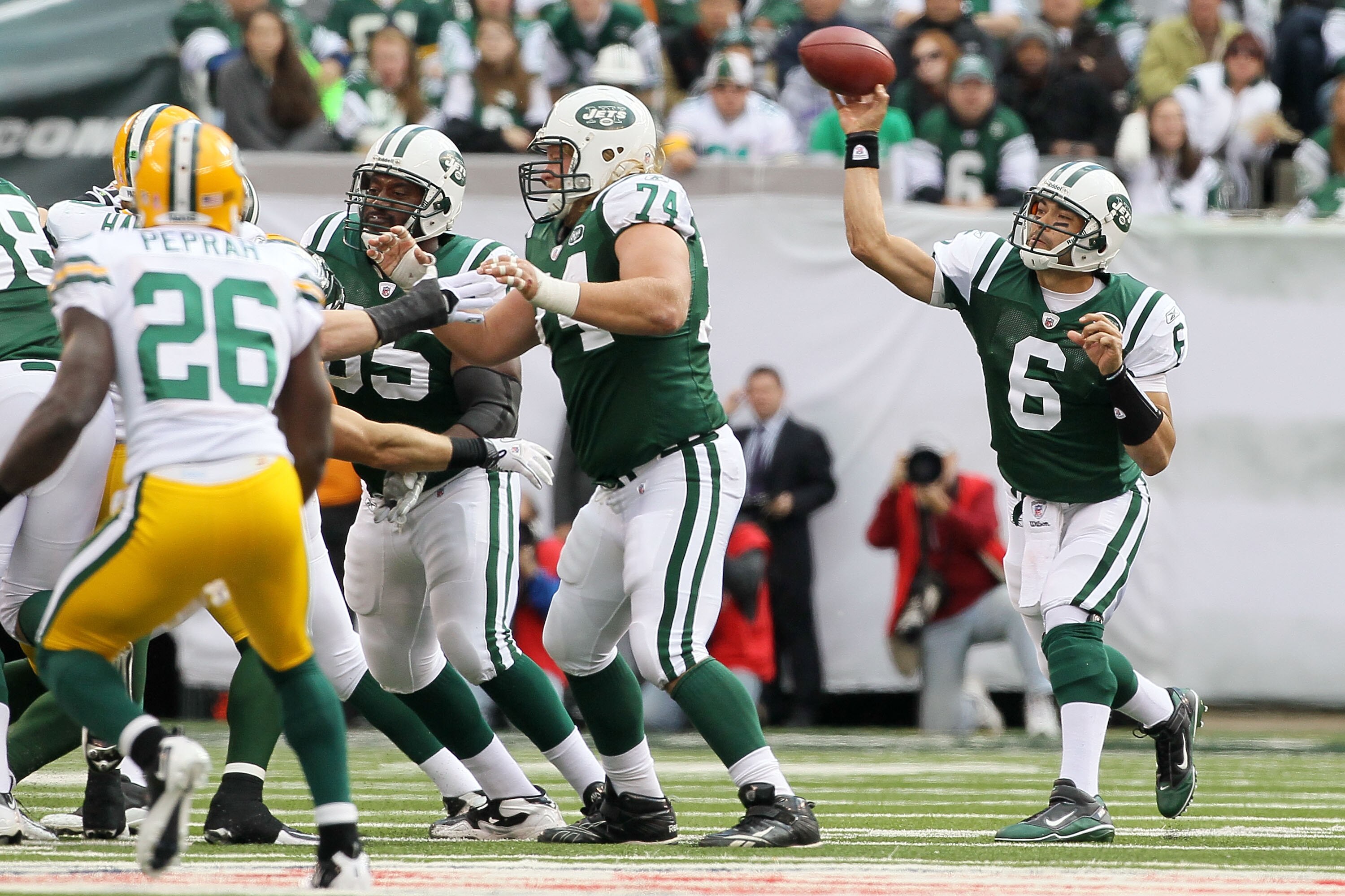 EAST RUTHERFORD, NJ - OCTOBER 31:  Mark Sanchez #6 of the New York Jets throws a pass against the Green Bay Packers on October 31, 2010 at the New Meadowlands Stadium in East Rutherford, New Jersey. The Packers defeated the Jets 9-0.  (Photo by Jim McIsaa