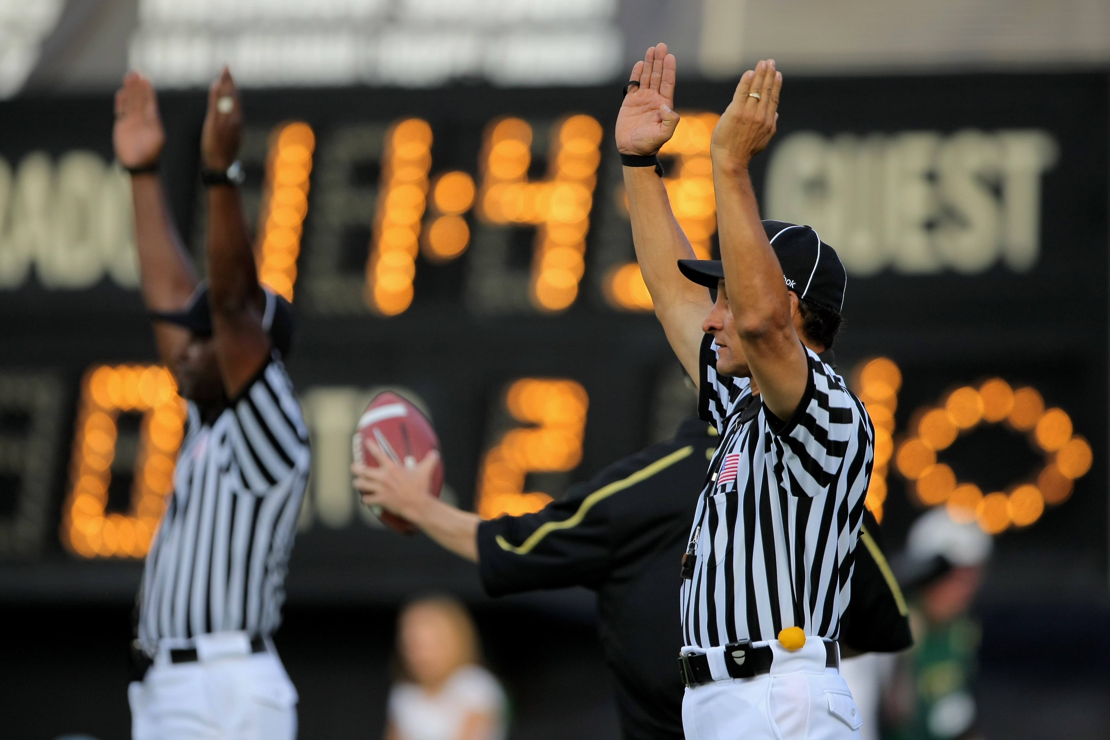 BOULDER, CO - SEPTEMBER 06:  Officials signal a field goal as the Colorado State Rams face the Colorado Buffaloes at Folsom Field on September 6, 2009 in Boulder, Colorado. The Rams defeated the Buffaloes 23-17.  (Photo by Doug Pensinger/Getty Images)