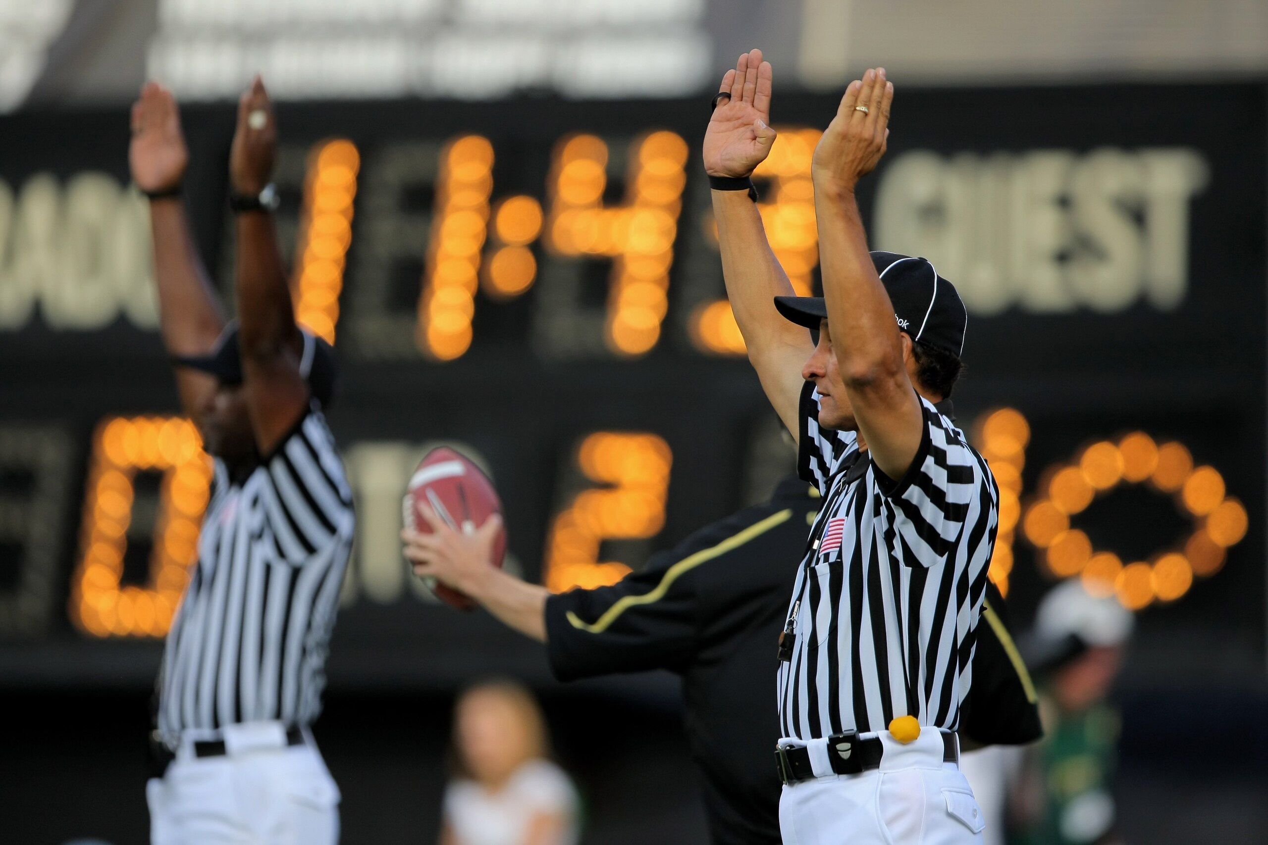 BOULDER, CO - SEPTEMBER 06:  Officials signal a field goal as the Colorado State Rams face the Colorado Buffaloes at Folsom Field on September 6, 2009 in Boulder, Colorado. The Rams defeated the Buffaloes 23-17.  (Photo by Doug Pensinger/Getty Images)