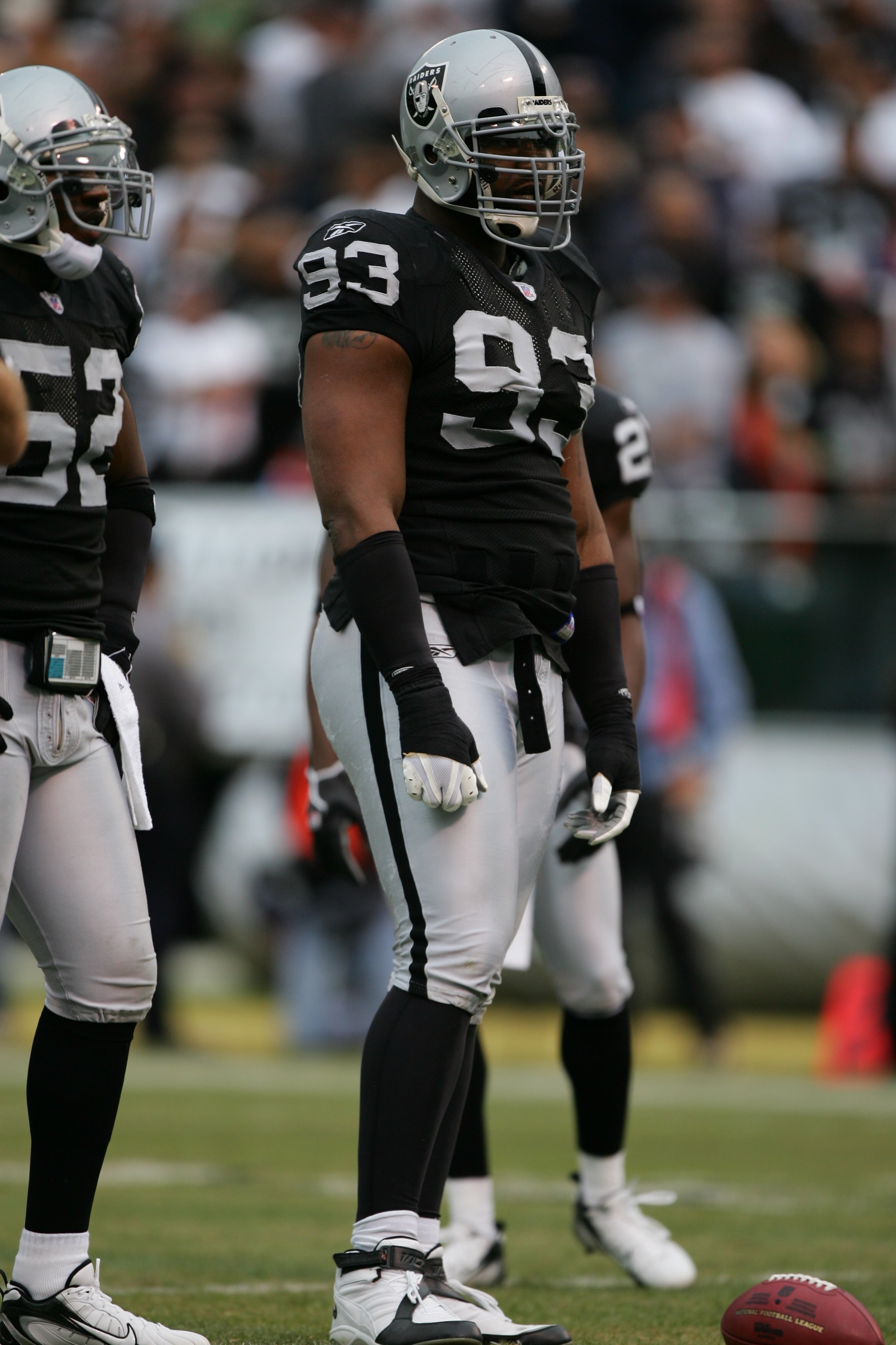 OAKLAND, CA - NOVEMBER 12:  Defensive tackle Tommy Kelly #93 of the Oakland Raiders stands on the field against the Denver Broncos at McAfee Coliseum on November 12, 2006 in Oakland, California. The Broncos defeated the Raiders 17-13. (Photo by Jed Jacobs