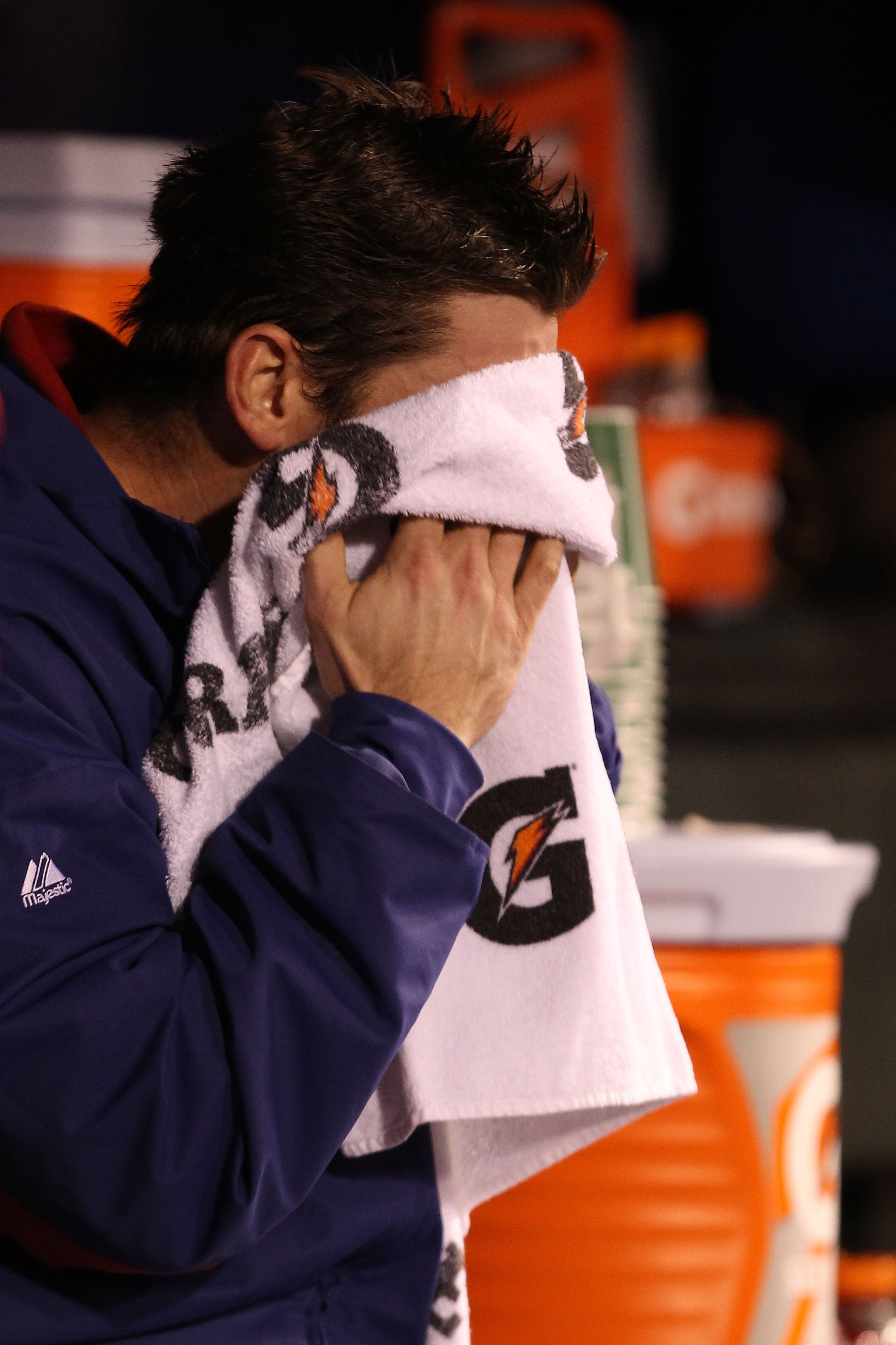 SAN FRANCISCO - OCTOBER 27:  Cliff Lee #33 of the Texas Rangers wipes his face after coming out of the game against the San Francisco Giants in Game One of the 2010 MLB World Series at AT&T Park on October 27, 2010 in San Francisco, California.  (Photo by