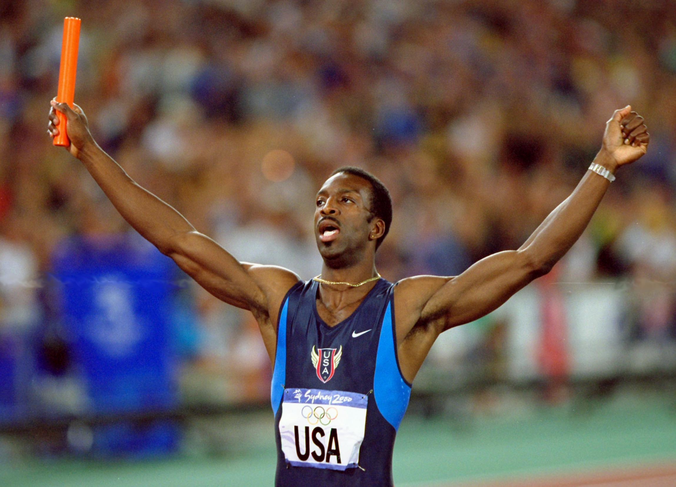 30 Sep 2000:  Michael Johnson anchors the USA to victory in the Mens 4x400m Relay Final at the Olympic Stadium on Day 15 of the Sydney 2000 Olympic Games in Sydney, Australia. \ Mandatory Credit: Mike Powell /Allsport