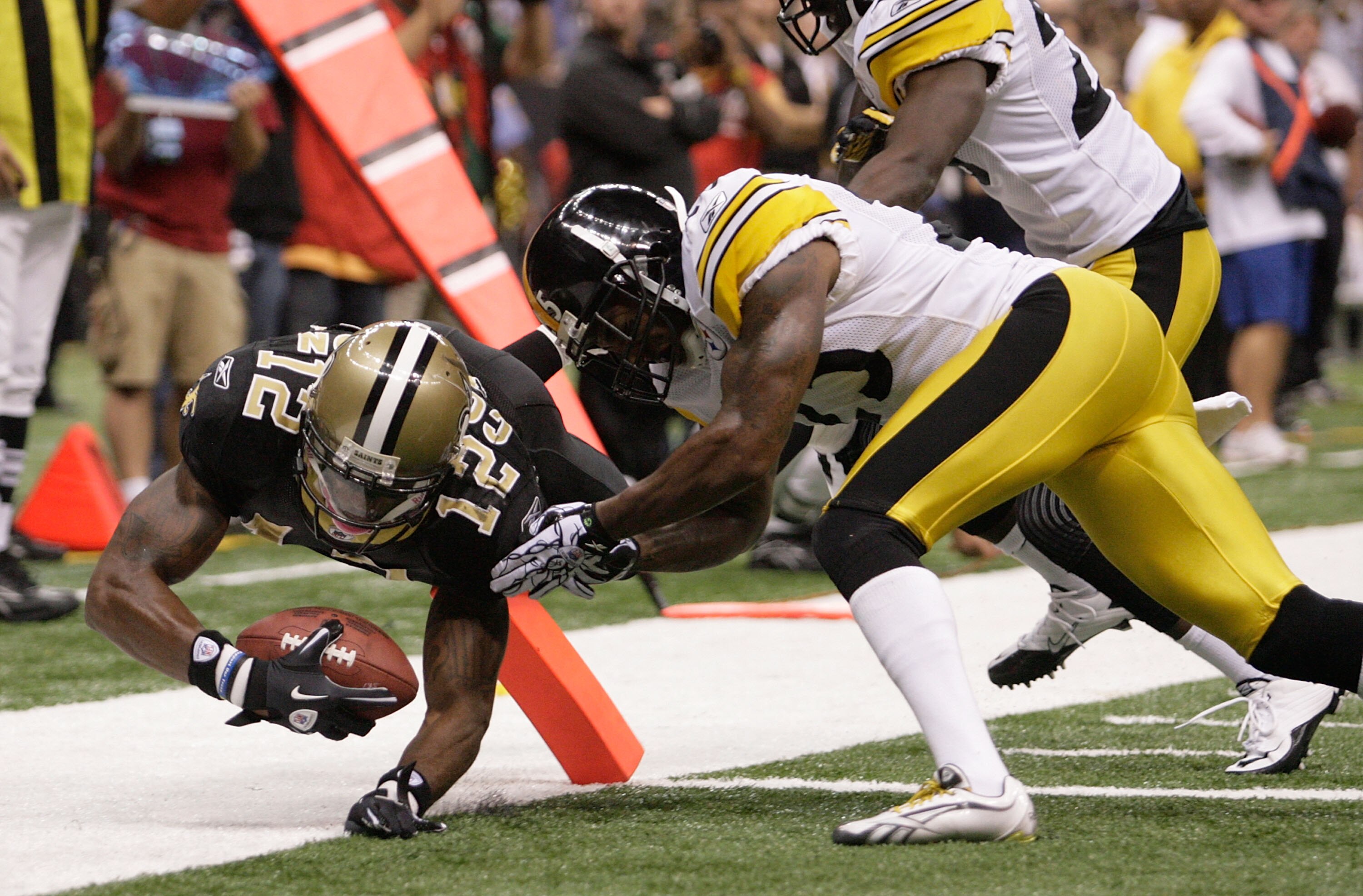 NEW ORLEANS - OCTOBER 31: Marques Colston #12 of the New Orleans Saints scores a touchdown against the Pittsburgh Steelers at the Louisiana Superdome on October 31, 2010 in New Orleans, Louisiana. (Photo by Matthew Sharpe/Getty Images)