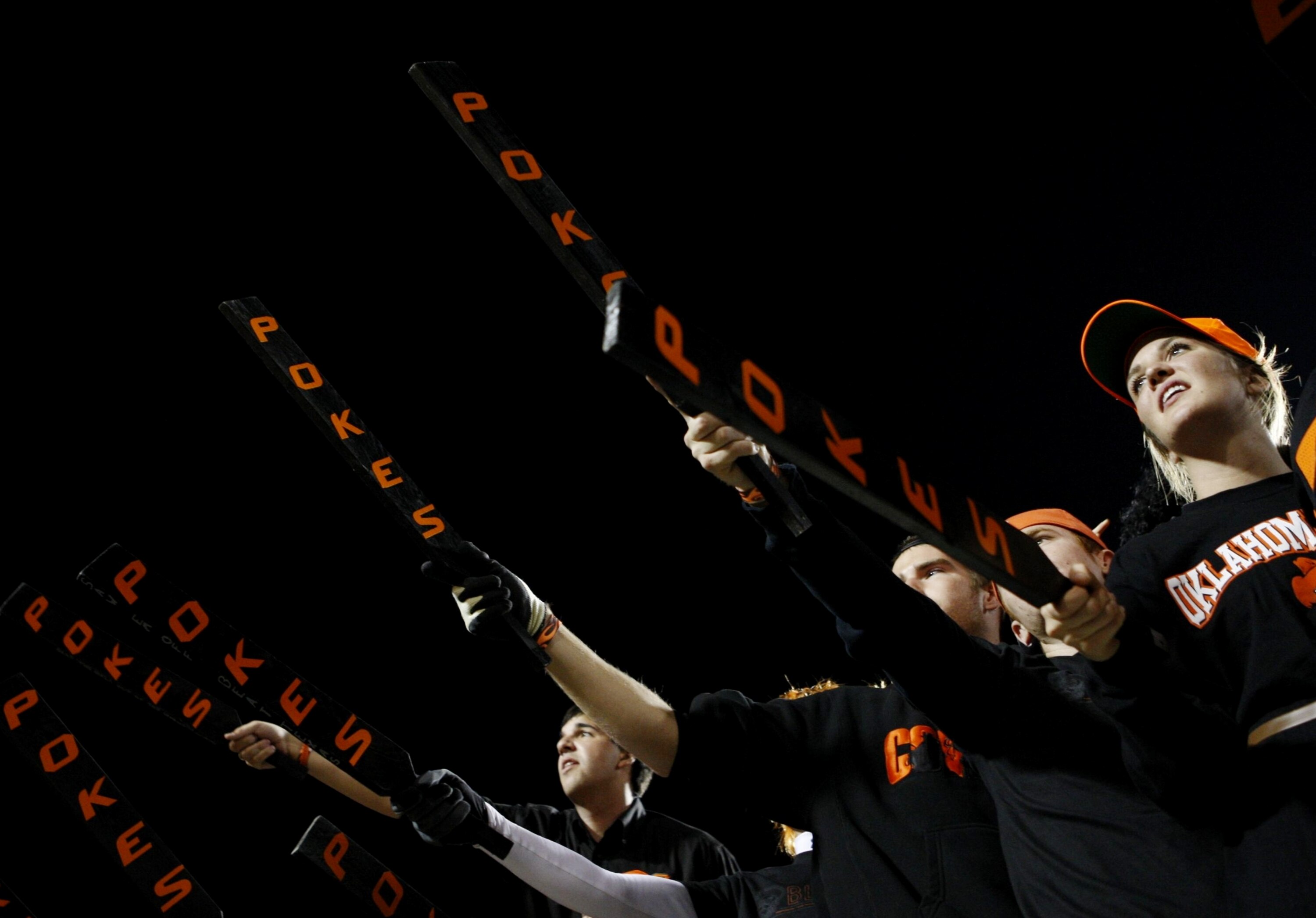 STILLWATER, OK - OCTOBER 31: Fans of the Oklahoma State Cowboys cheer on their team in the game against the Texas Longhorns at Boone Pickens Stadium on October 31, 2009 in Stillwater, Oklahoma. (Photo by Ronald Martinez/Getty Images)
