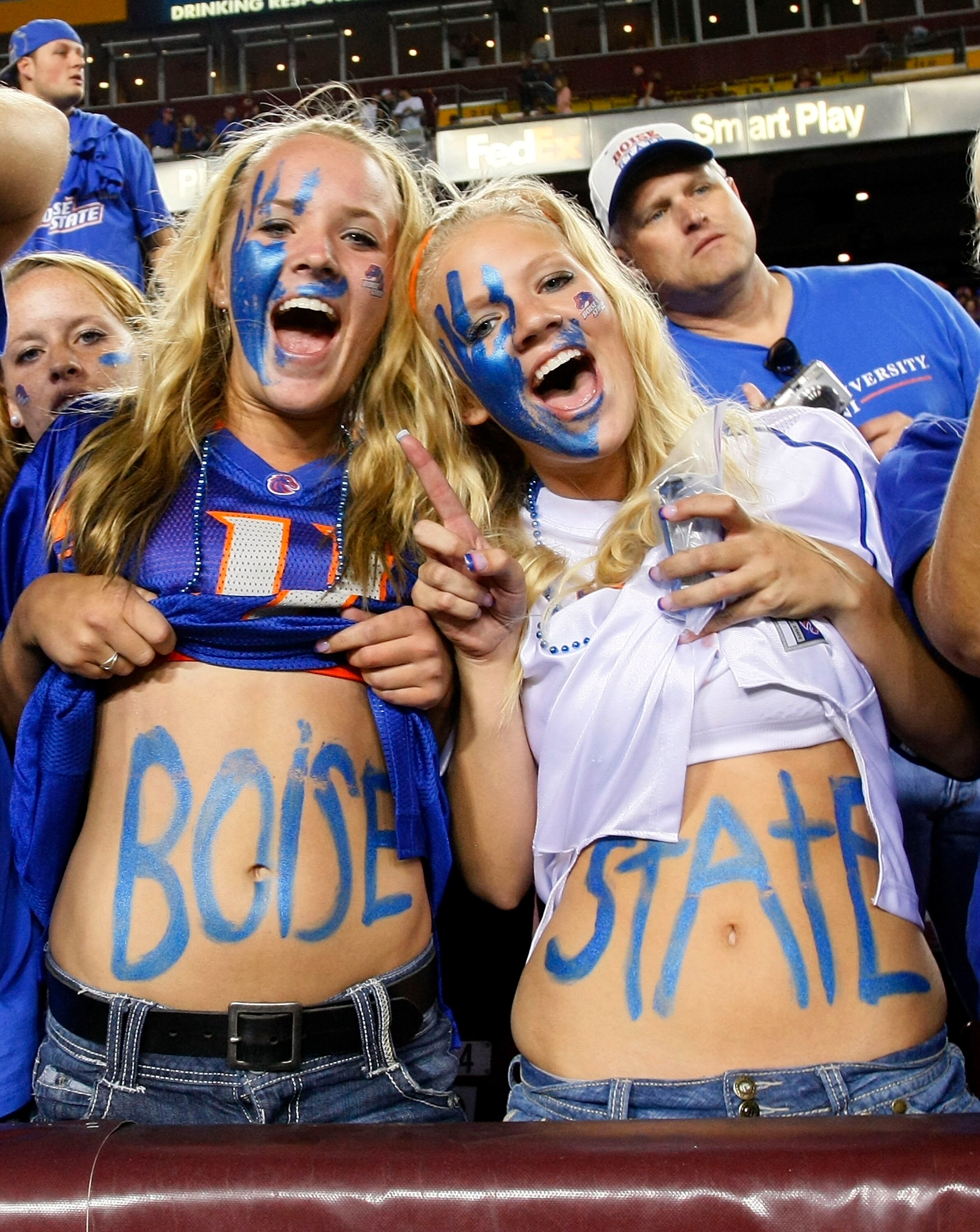 LANDOVER, MD - SEPTEMBER 06:  Boise State Broncos fans cheer from the stands against the Virginia Tech Hokies at FedExField on September 6, 2010 in Landover, Maryland.  (Photo by Geoff Burke/Getty Images)